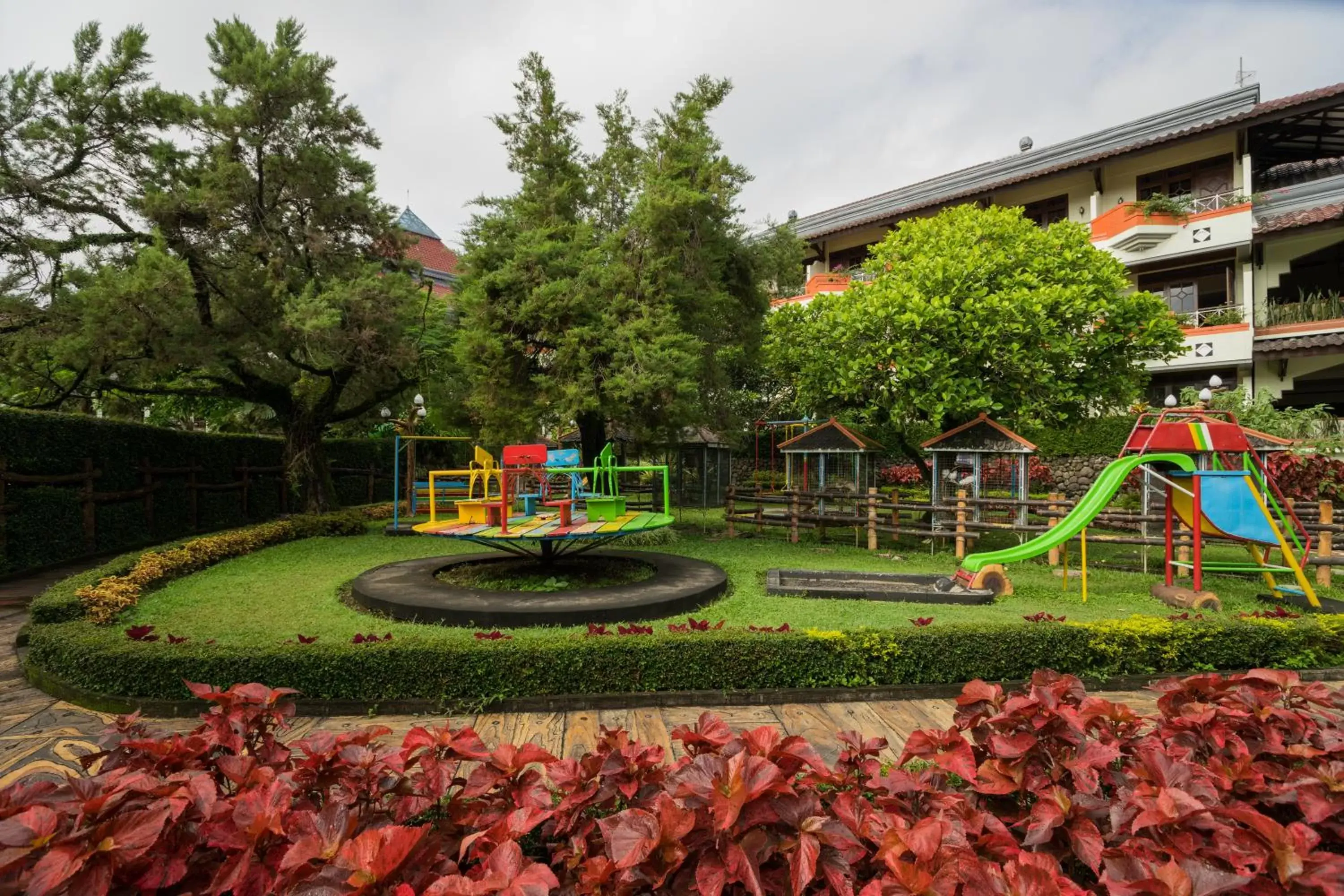 Garden, Children's Play Area in Royal Orchids Garden Hotel & Condominium