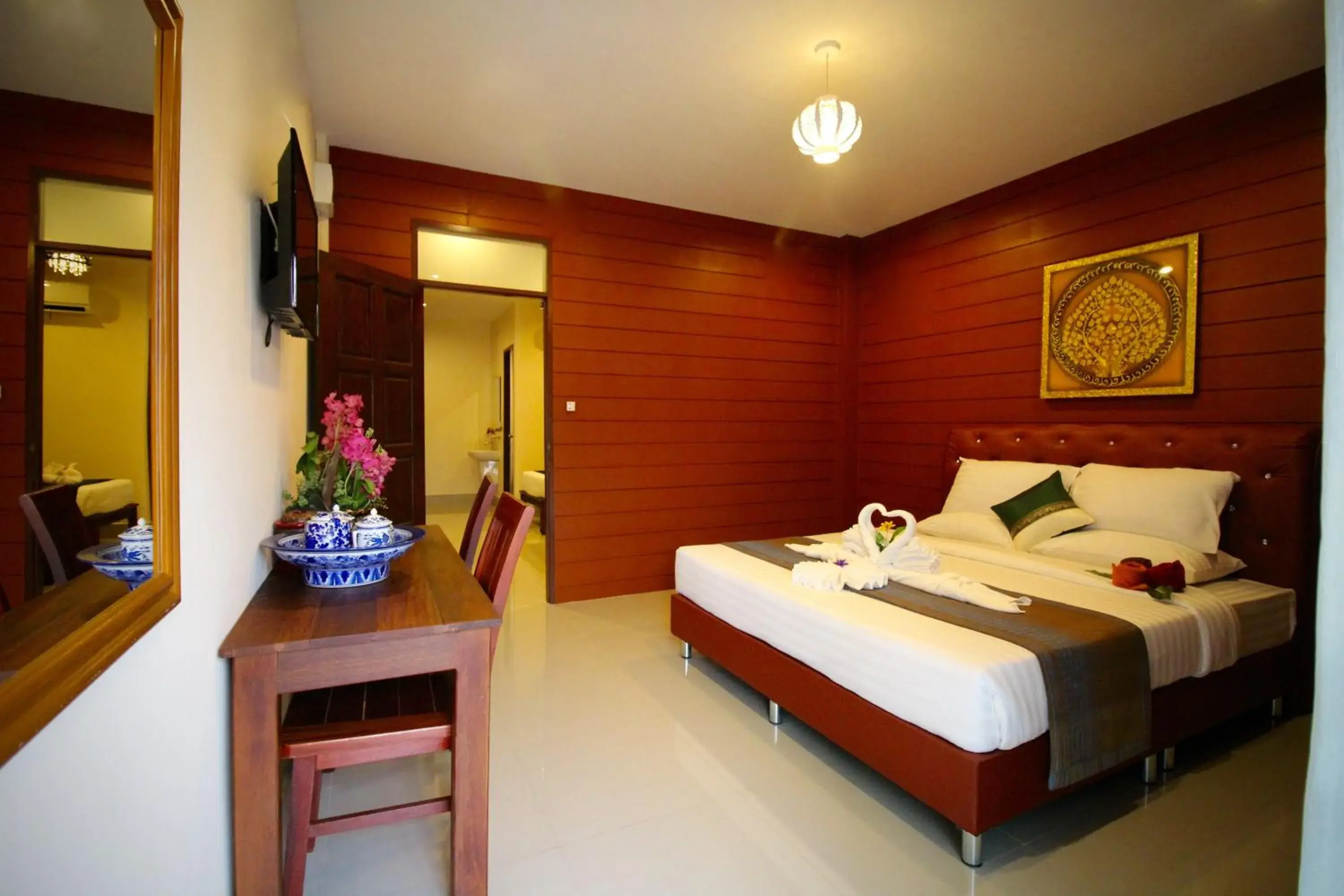 Bed in Srisiam Resort