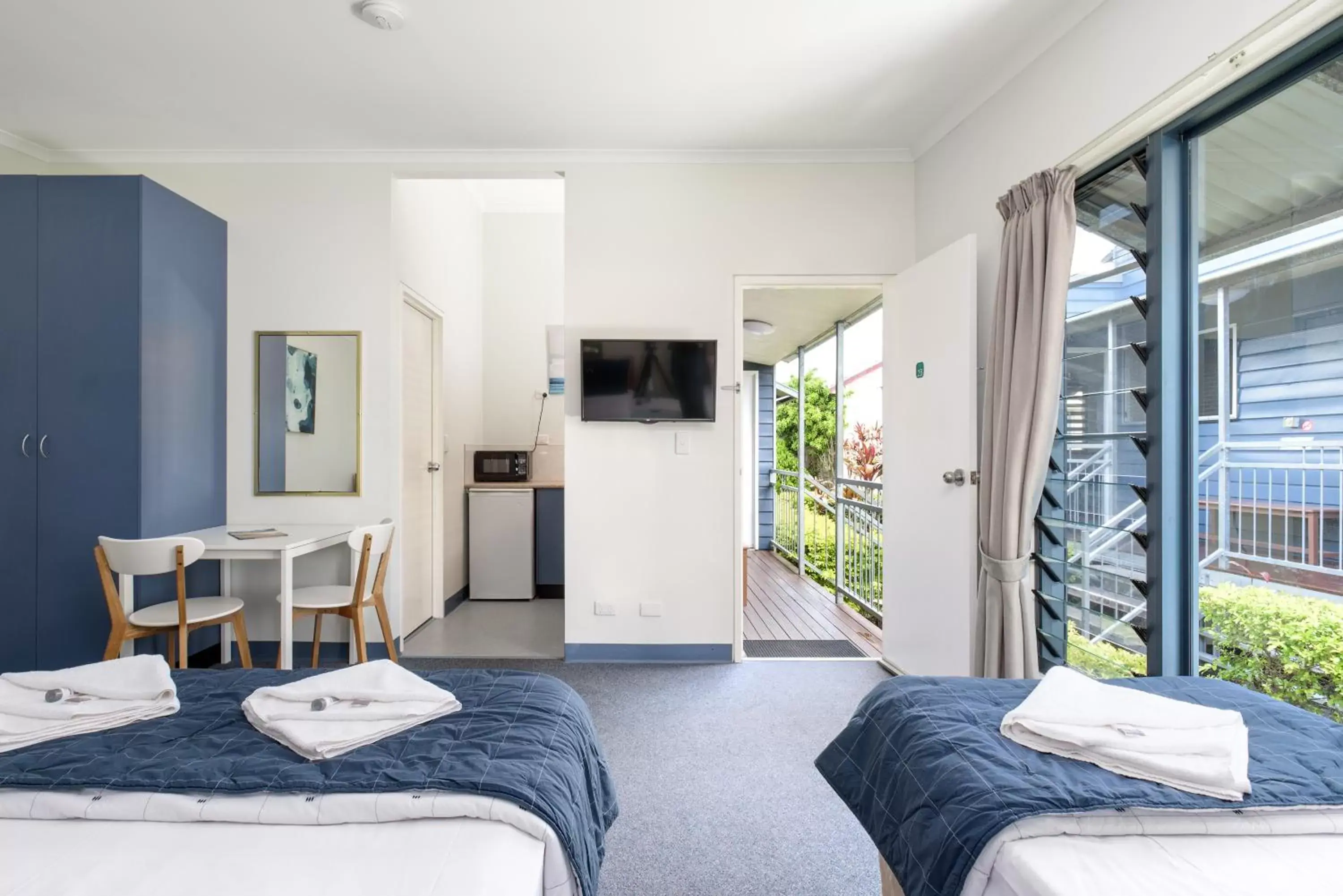 Photo of the whole room, Seating Area in Tin Can Bay's Sleepy Lagoon Motel