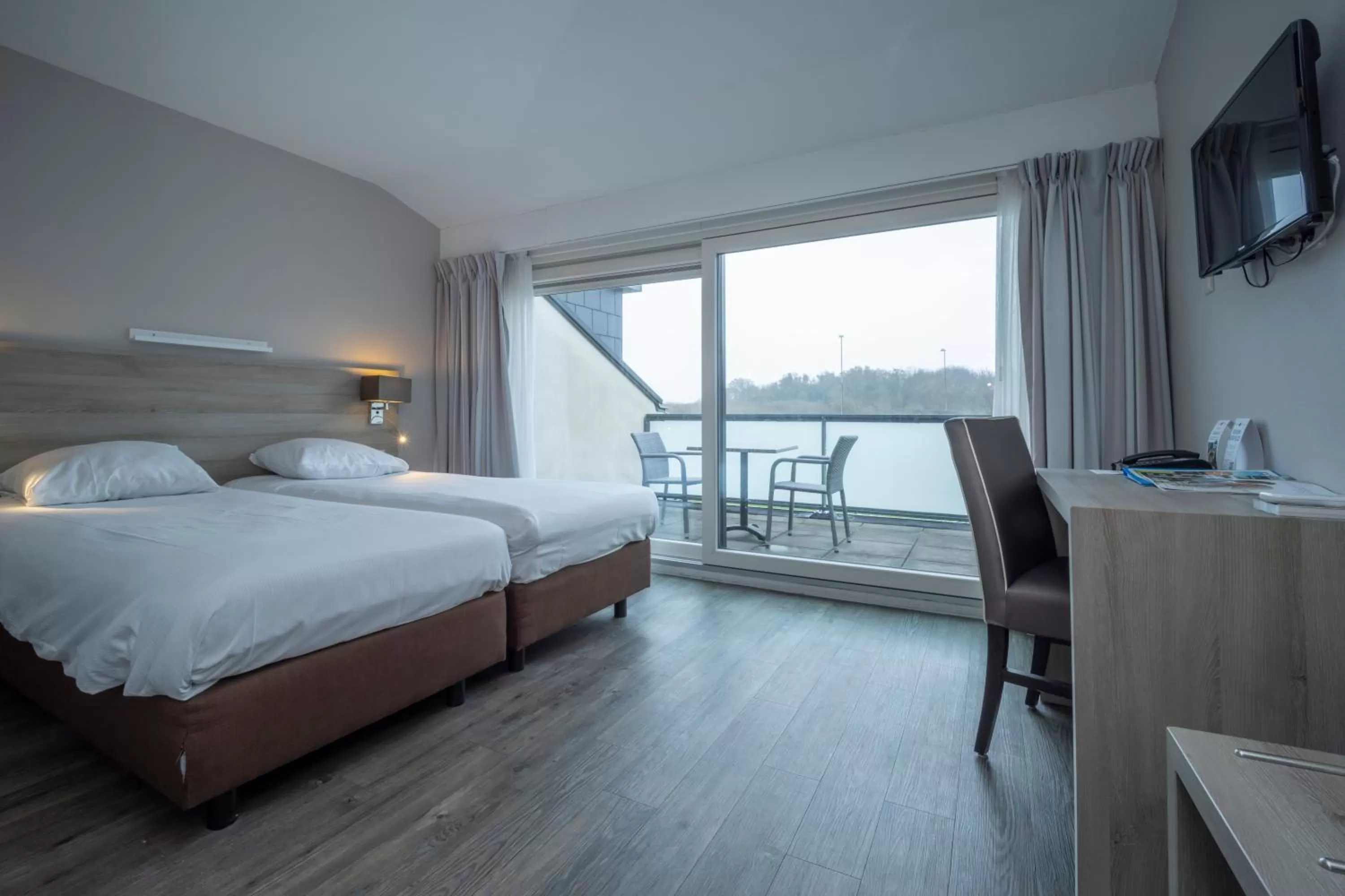 Bedroom, Bed in Fletcher Zuiderduin Beachhotel