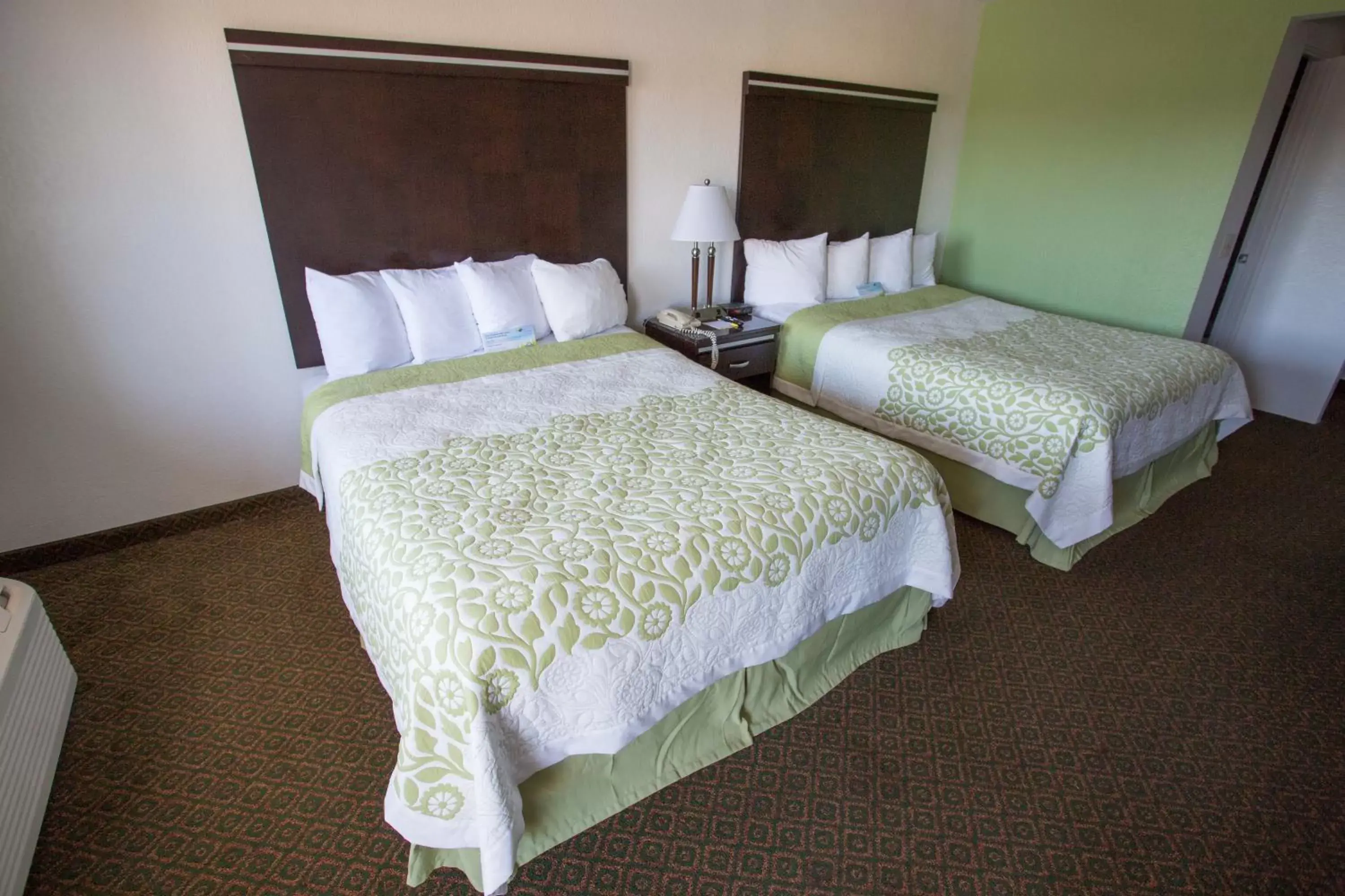 Bed in Days Inn by Wyndham Oceanside