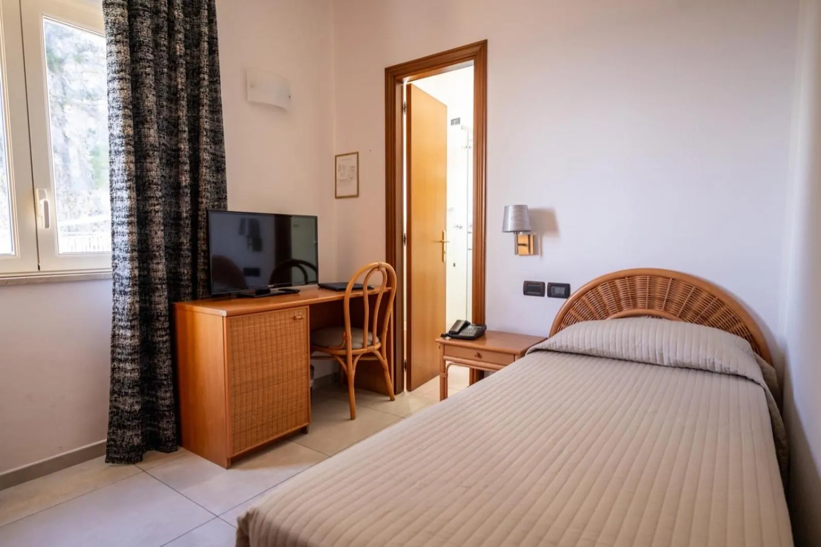 Bed in Hotel Corallo