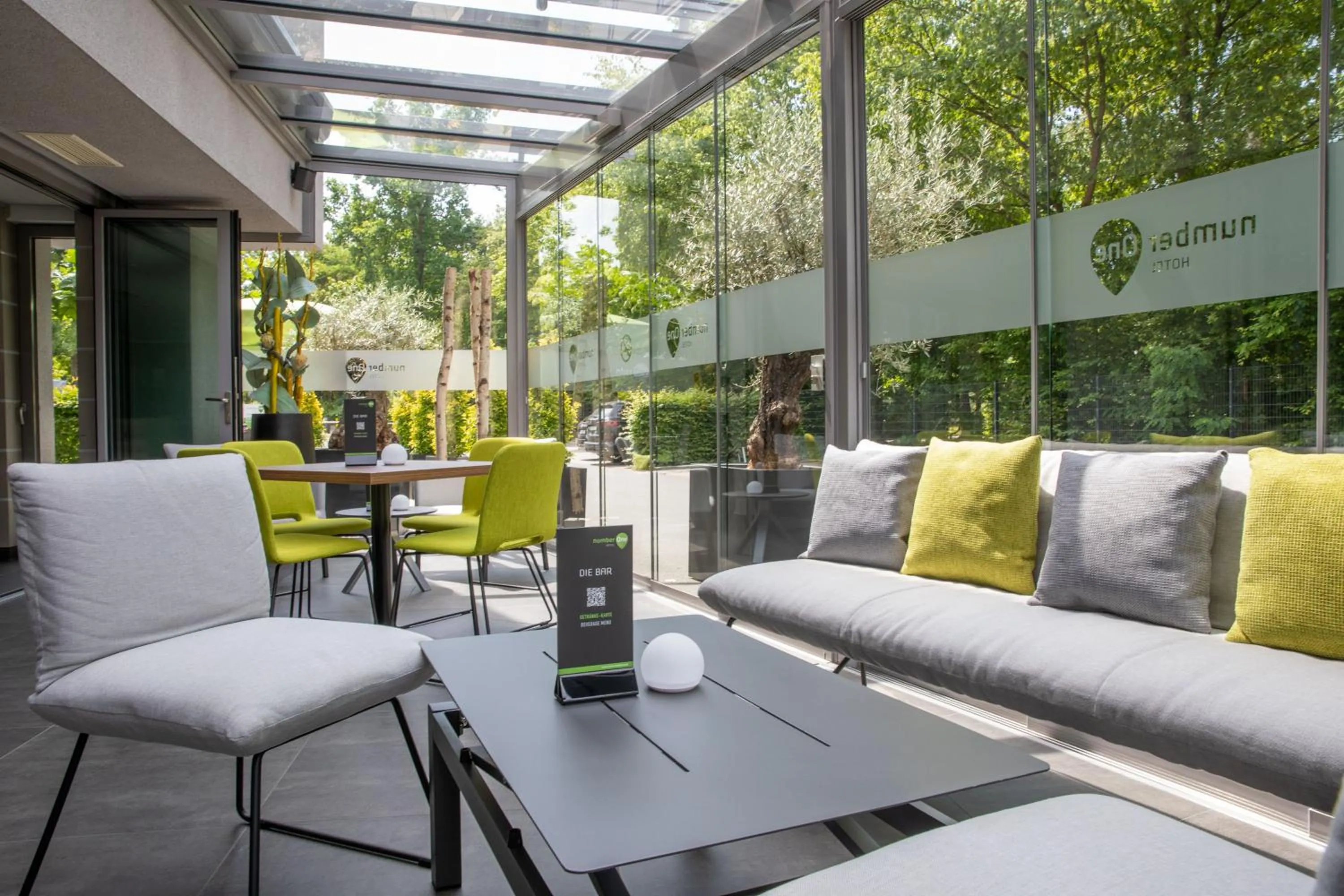 Communal lounge/ TV room in numberOne Hotel