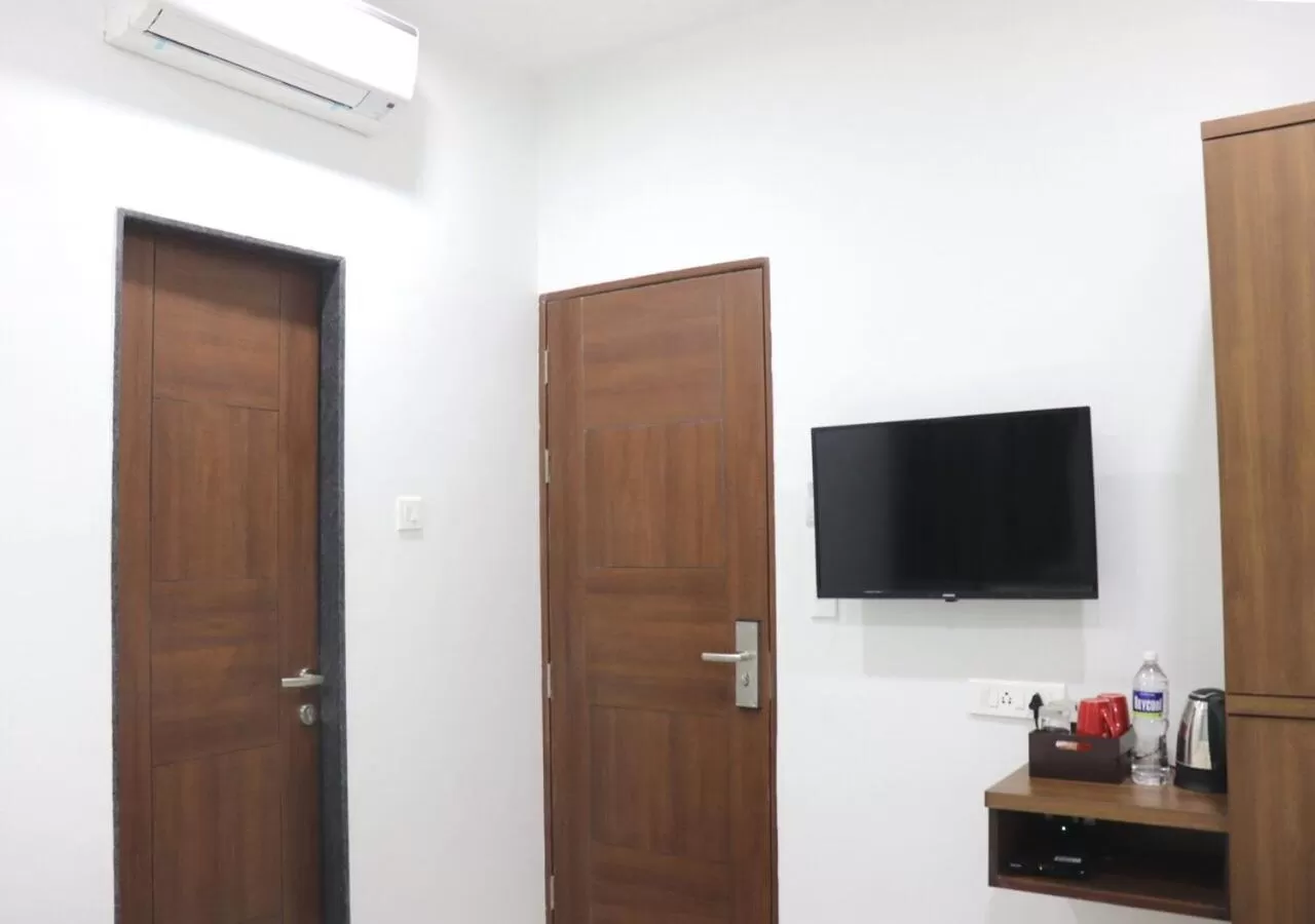 Bedroom in Sharman Suites