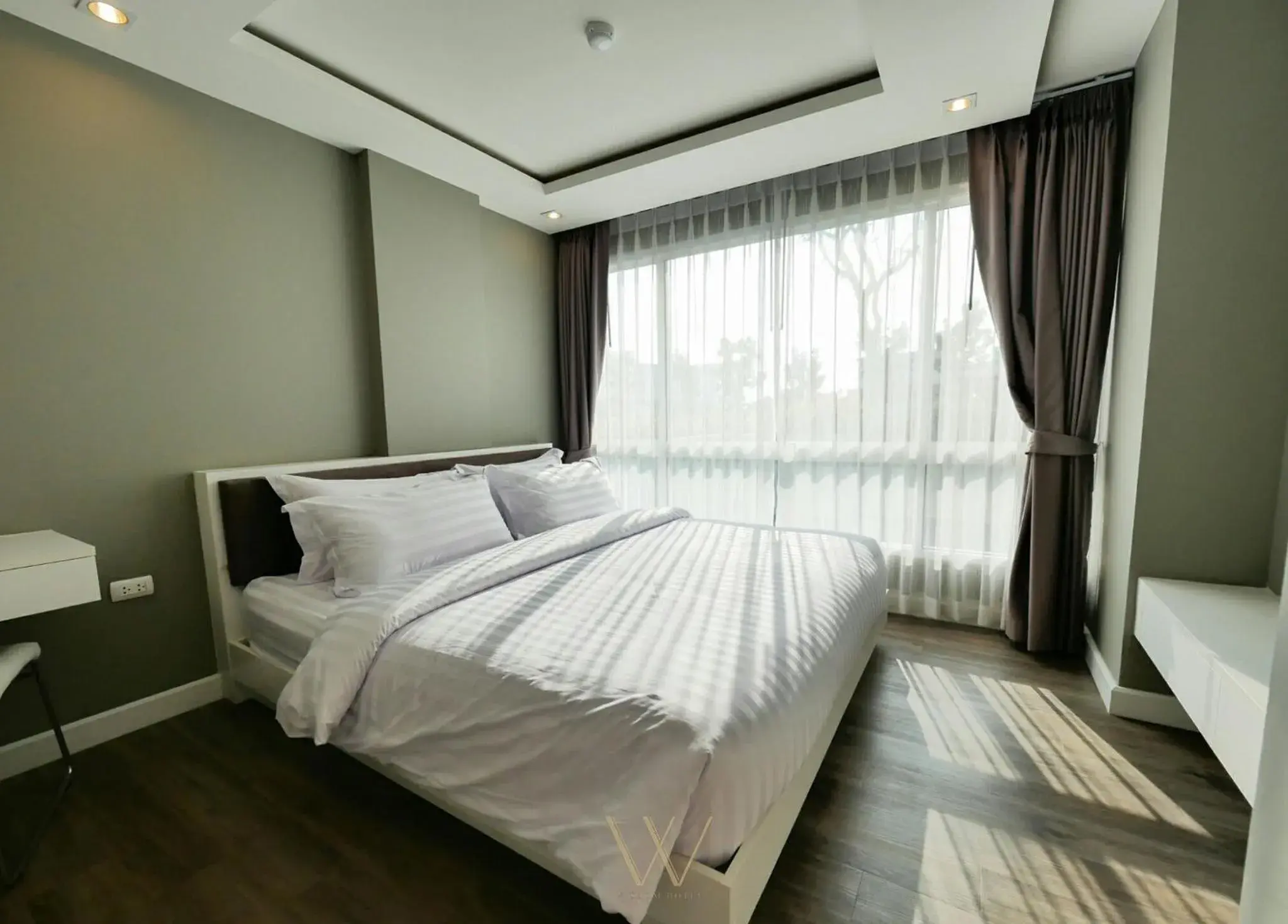 Bed in Wisdom Hotel