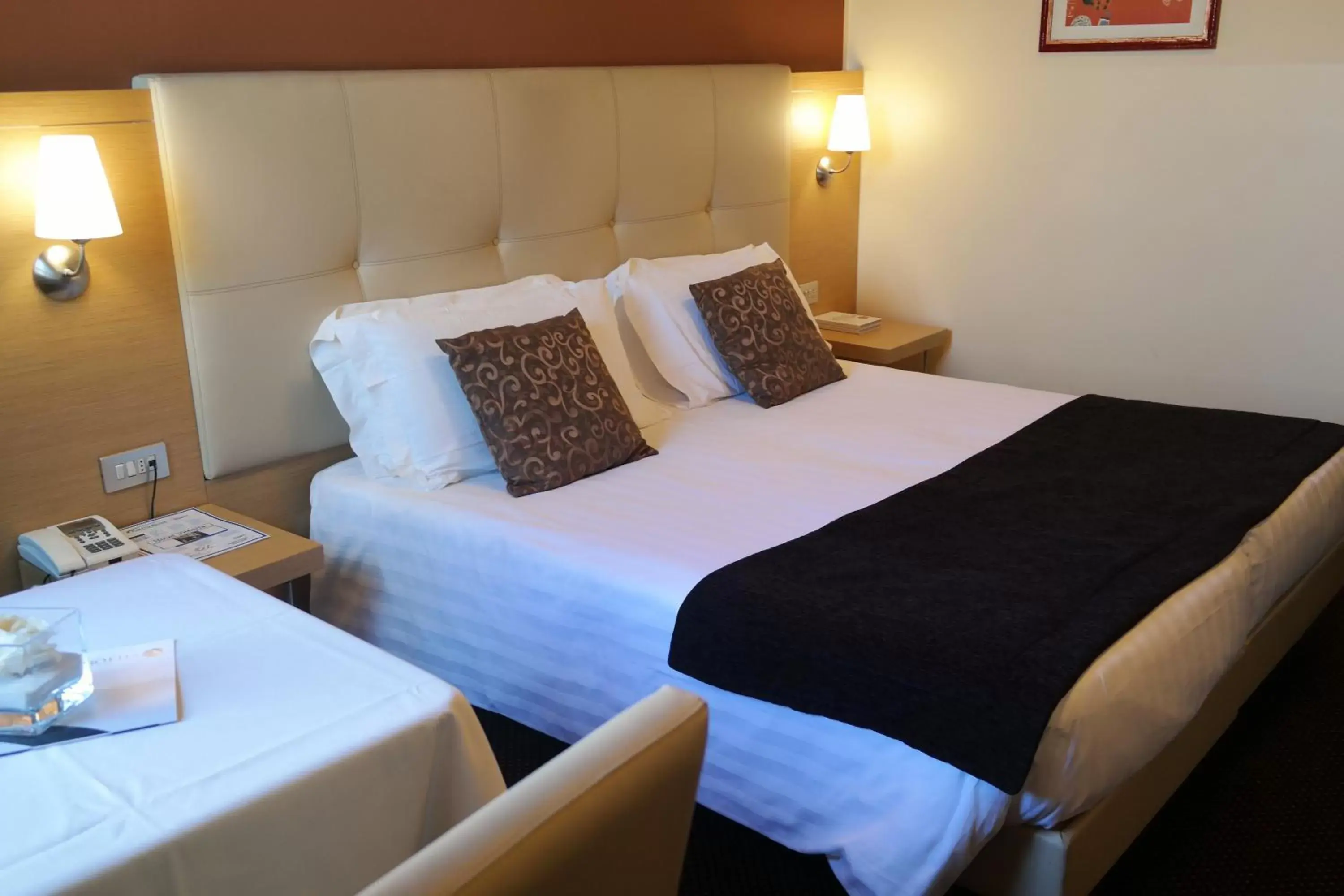 Bed in Hotel Vittoria Bed in Hotel Vittoria