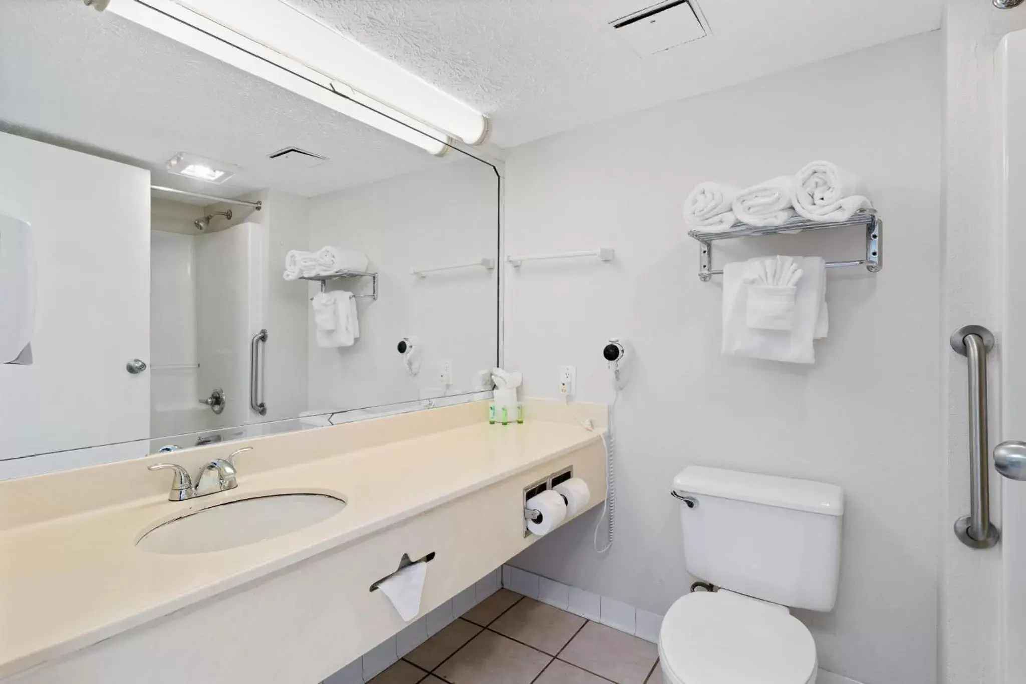 Bathroom in Beachcomber Beachfront Hotel, a By The Sea Resort