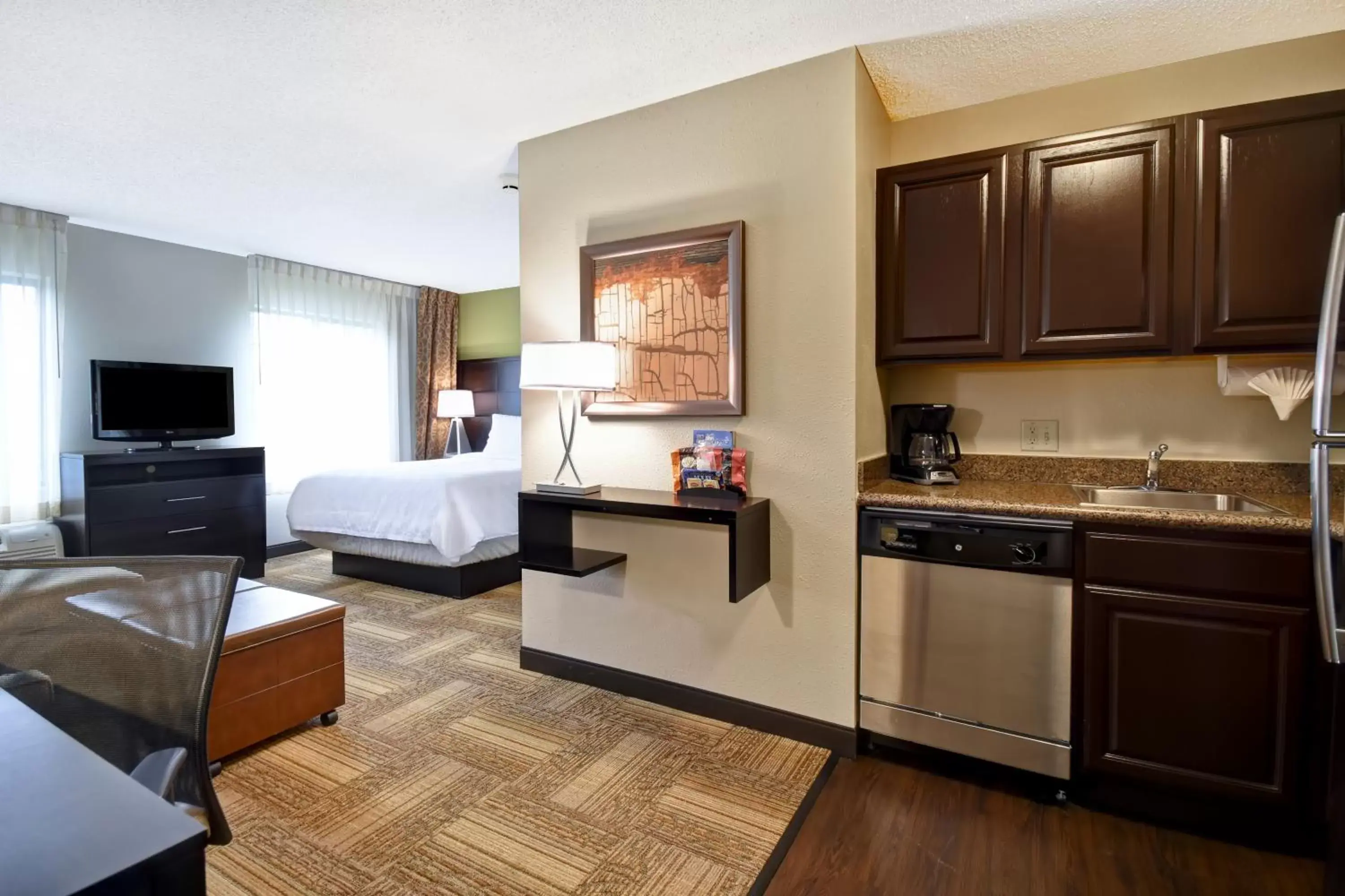 Photo of the whole room, Kitchen/Kitchenette in Staybridge Suites Grand Rapids-Kentwood, an IHG Hotel