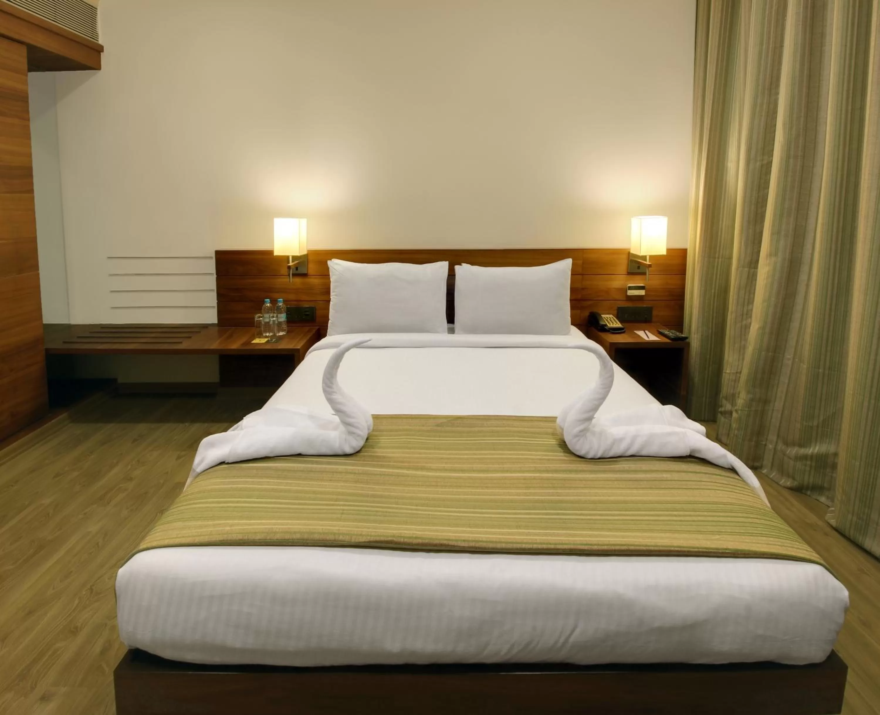 Bed in Temple Tree Hotel Shirdi, a member of Radisson Individuals