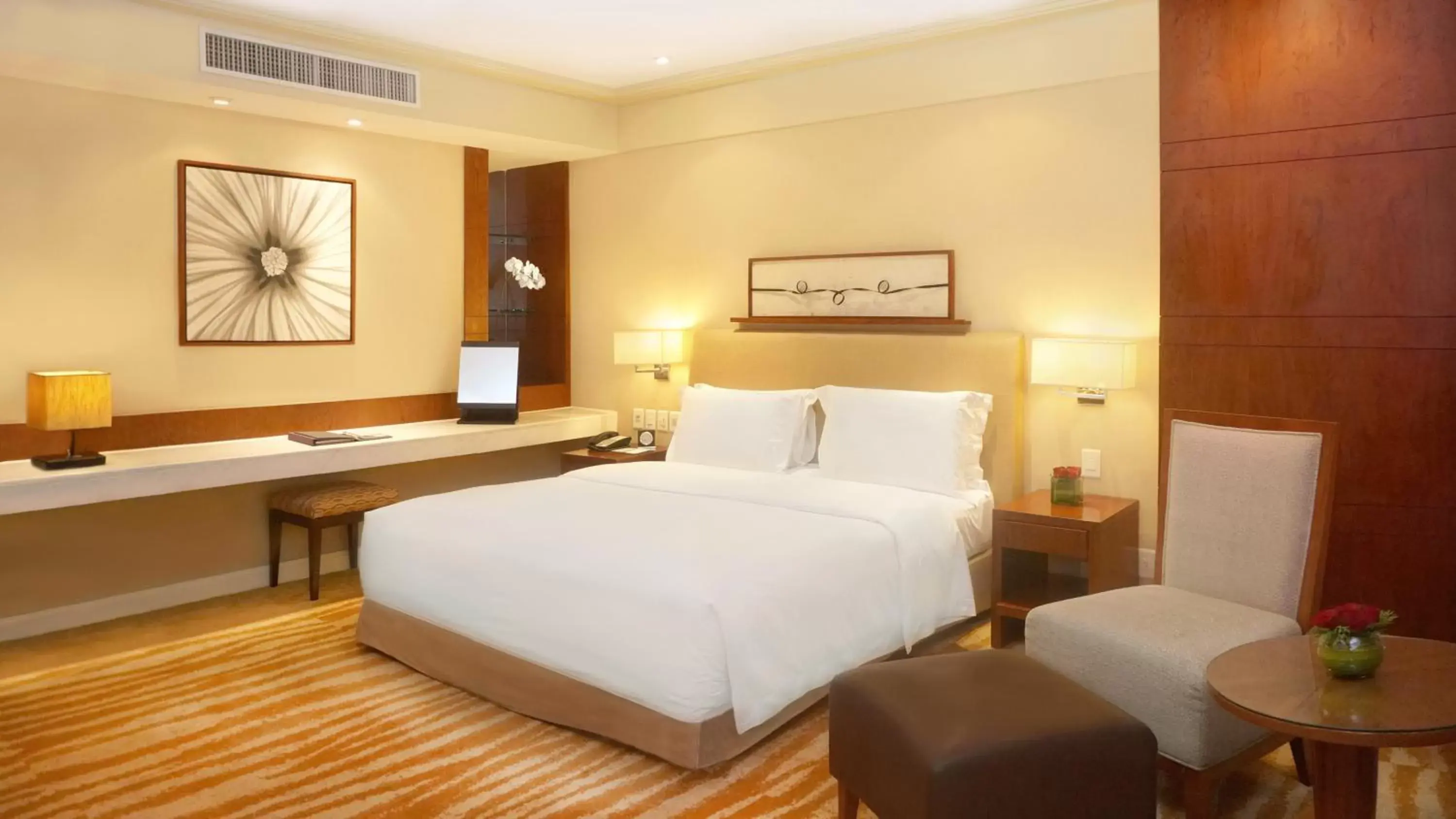 Bed in New Coast Hotel Manila (formerly New World Manila Bay Hotel)