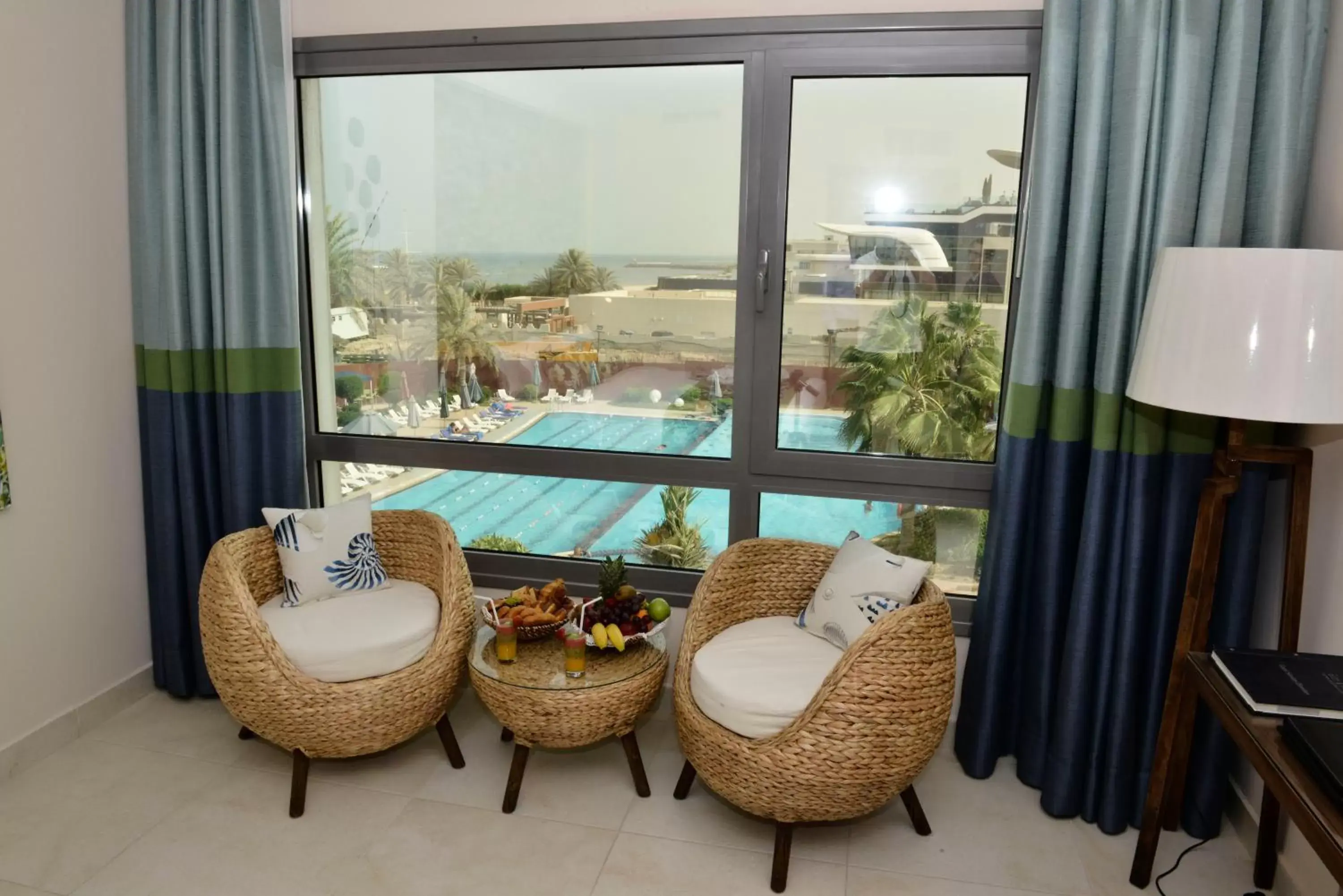 Bedroom, Seating Area in The Palms Beach Hotel & Spa