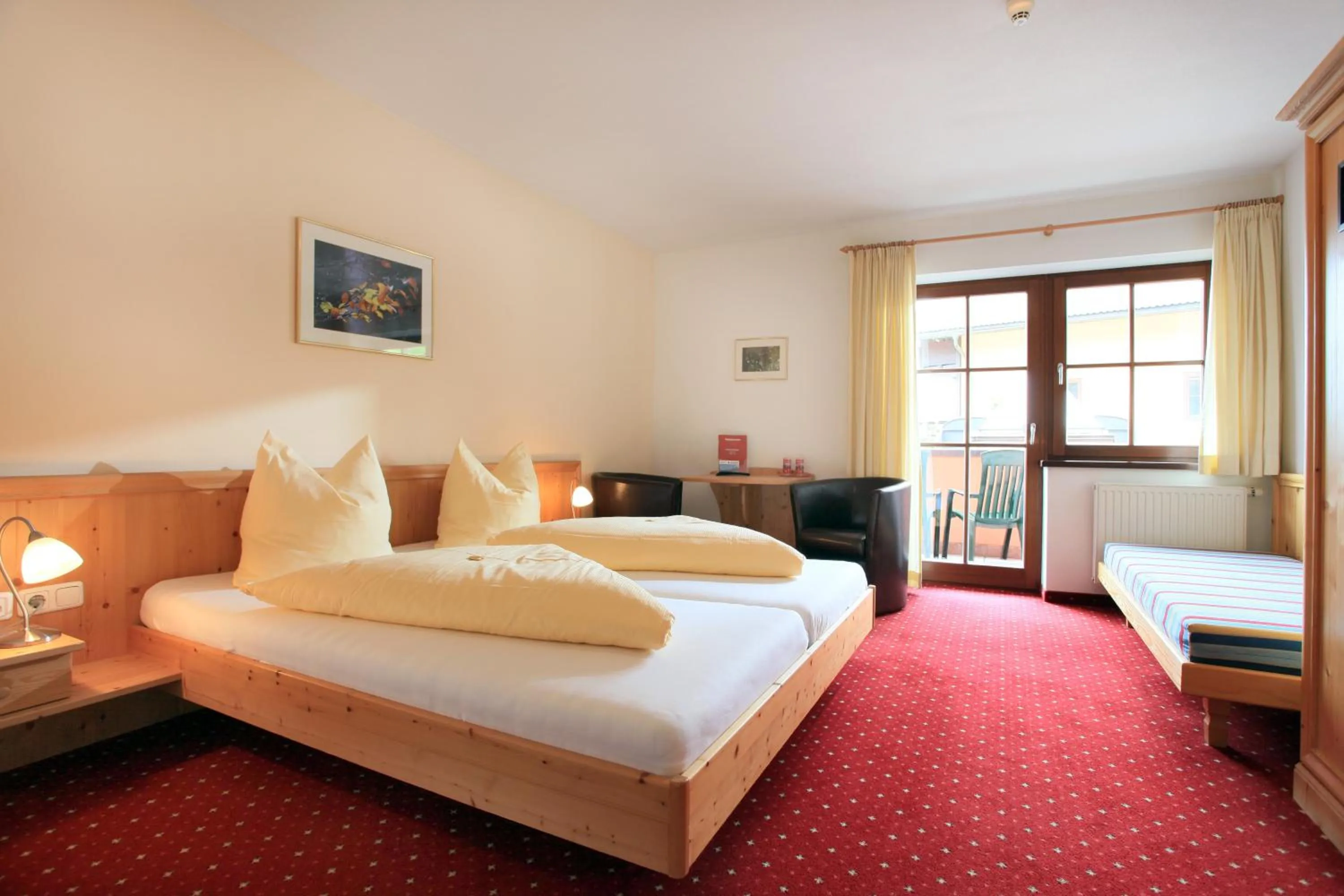 Photo of the whole room, Bed in Hotel Reitlwirt