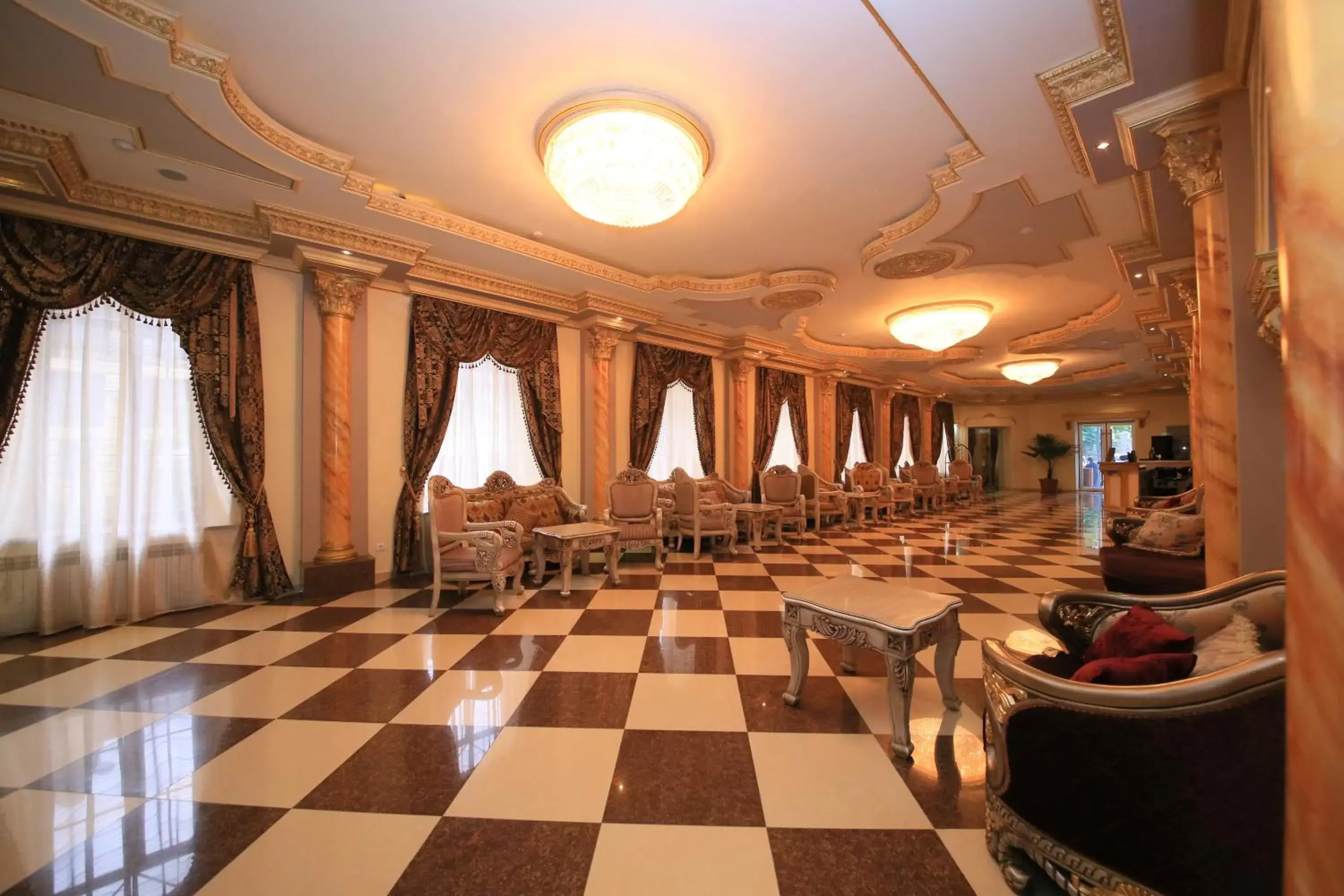 Communal lounge/ TV room in Borjomi Palace Health & Spa Center