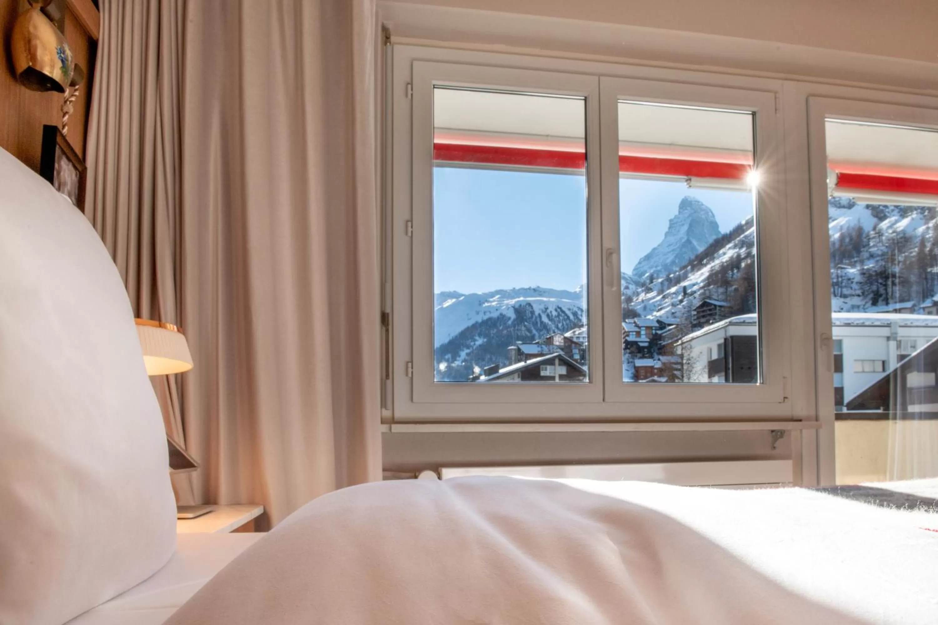 Landmark view, Bed in Schweizerhof Zermatt - a Small Luxury Hotel