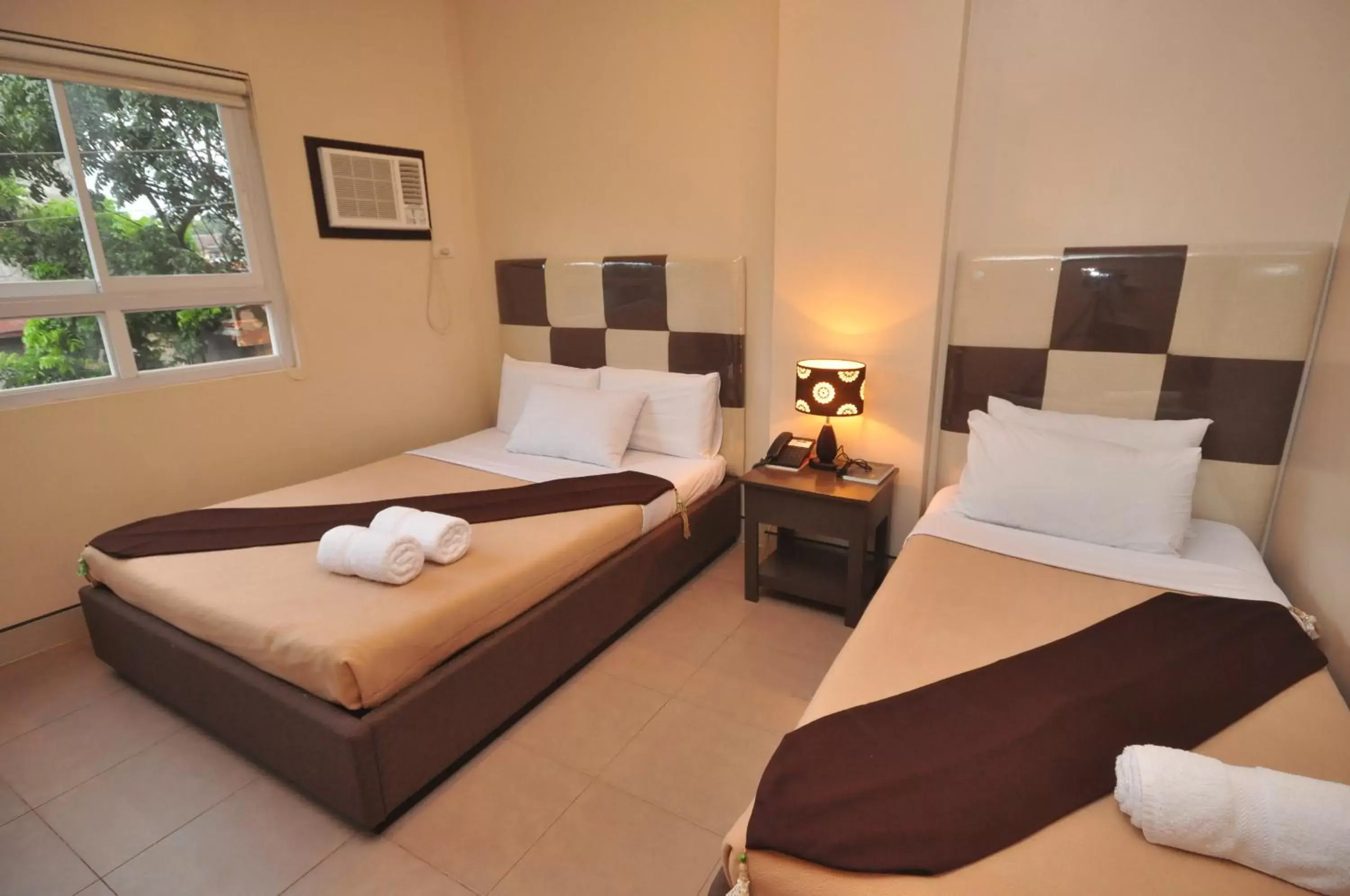 Bed in Grande Vista Hotel