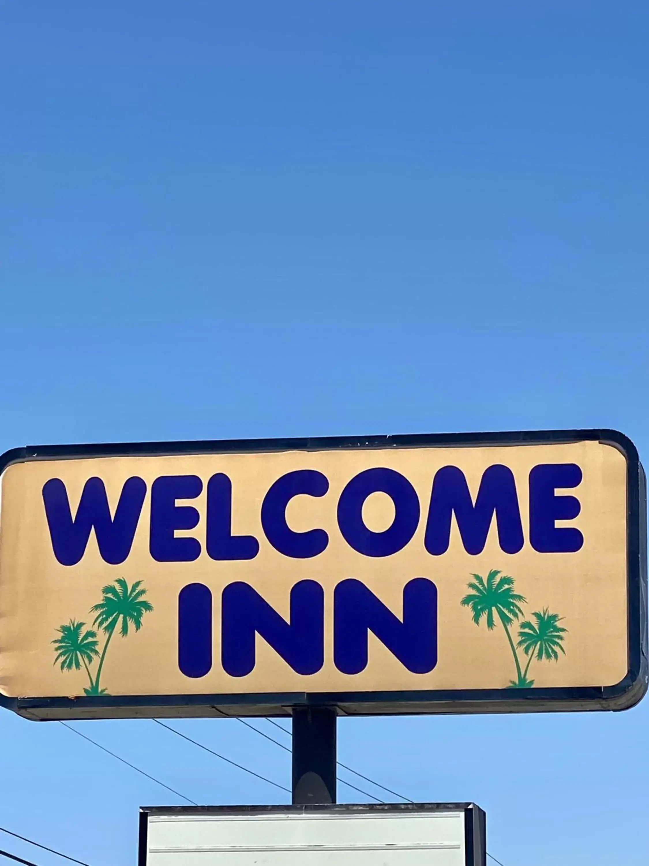 Property logo or sign in Welcome Inn