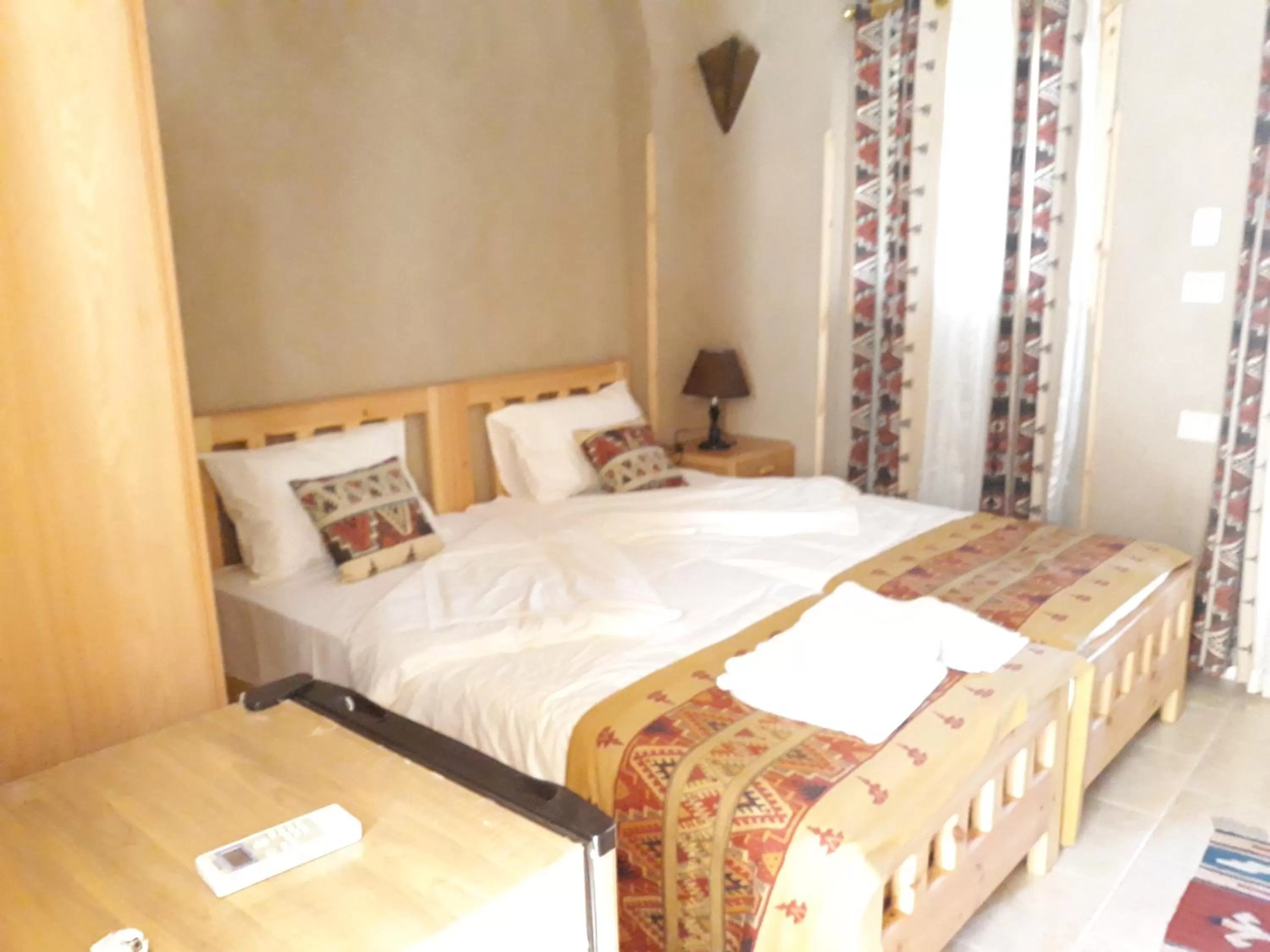 Bed in Embrace Hotel