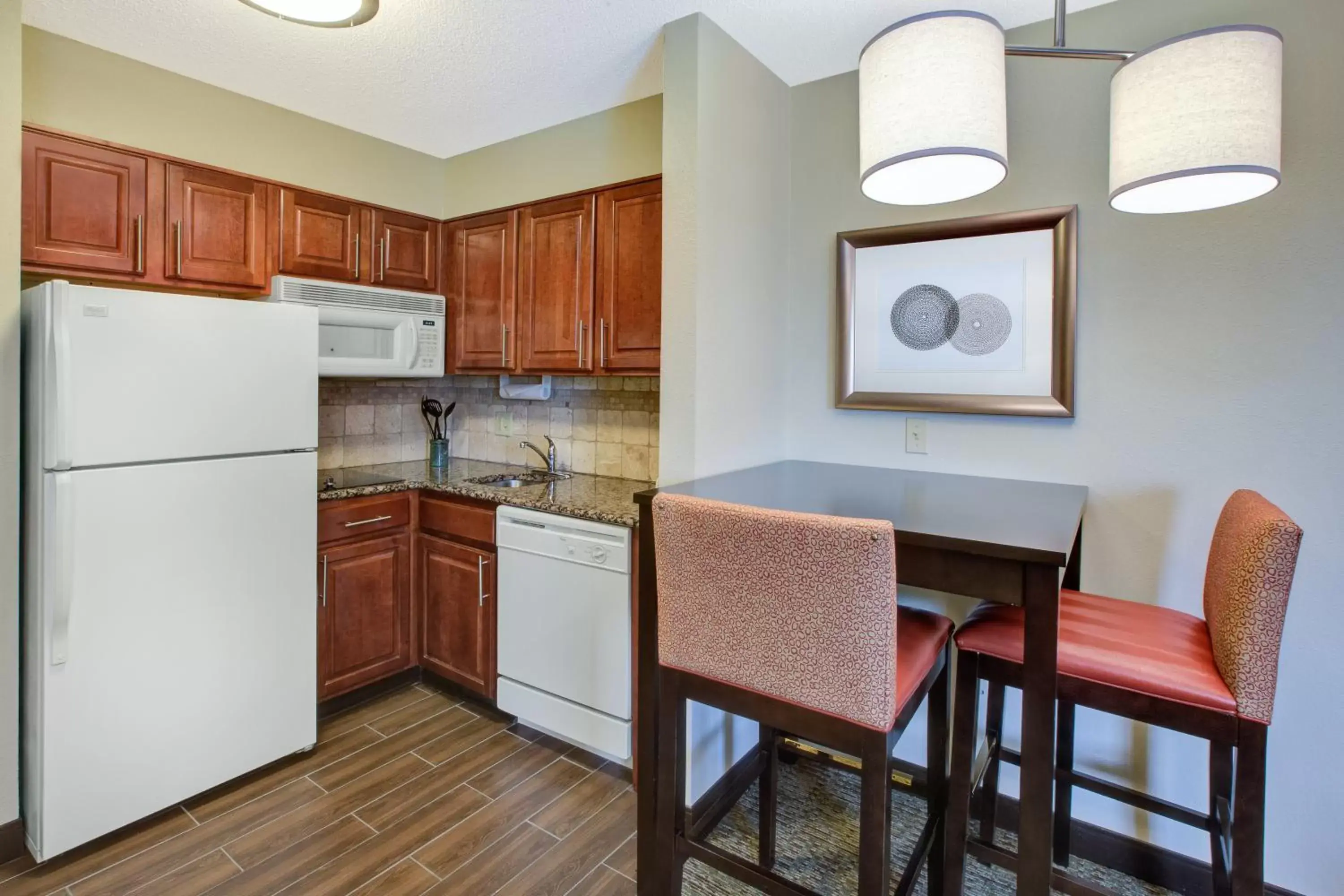 Photo of the whole room, Kitchen/Kitchenette in Staybridge Suites Louisville - East, an IHG Hotel