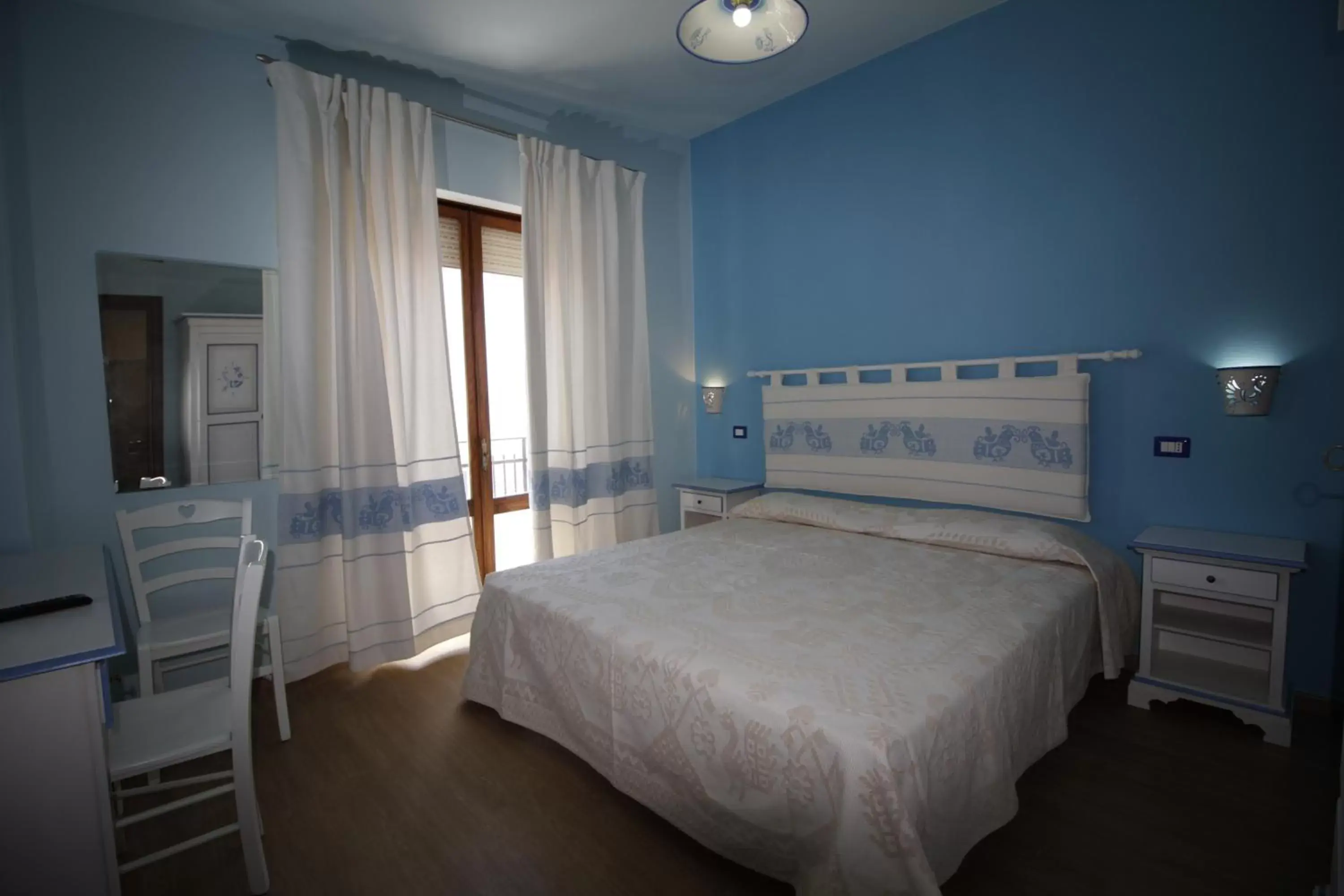 Photo of the whole room, Bed in B&B Selvaggio Blu