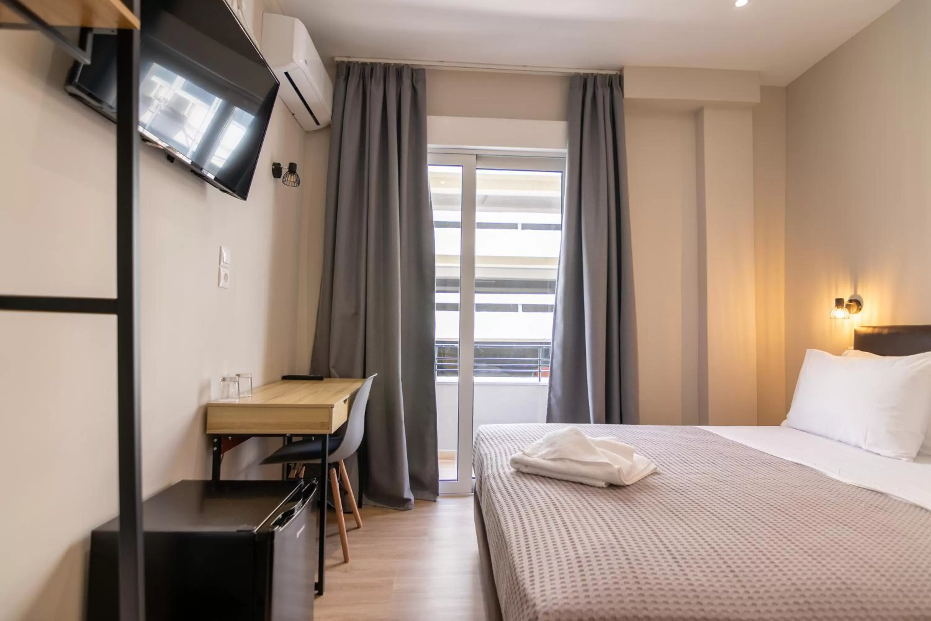 Photo of the whole room, Bed in New Amaryllis Hotel