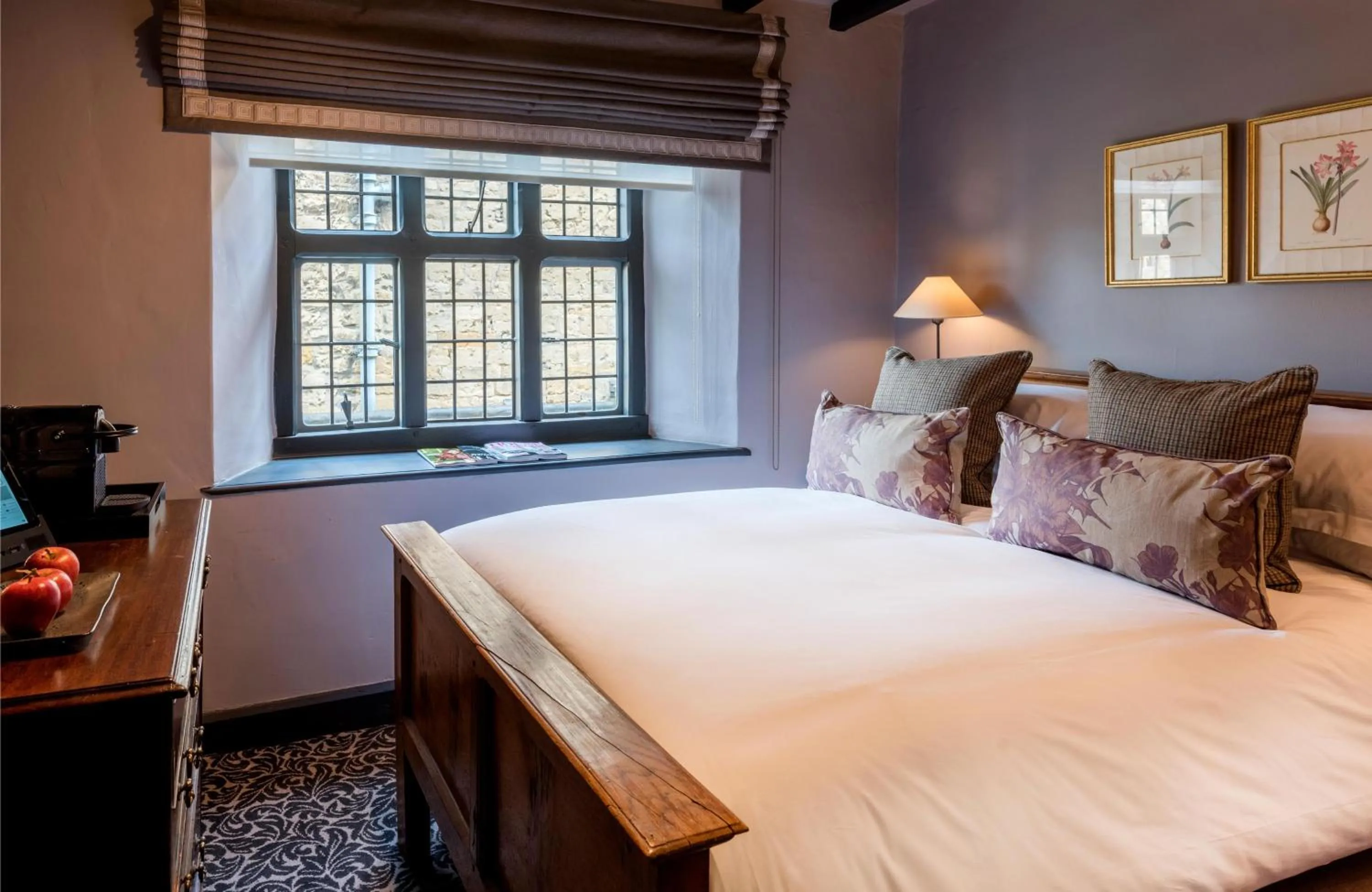 Bed in The Lygon Arms - an Iconic Luxury Hotel