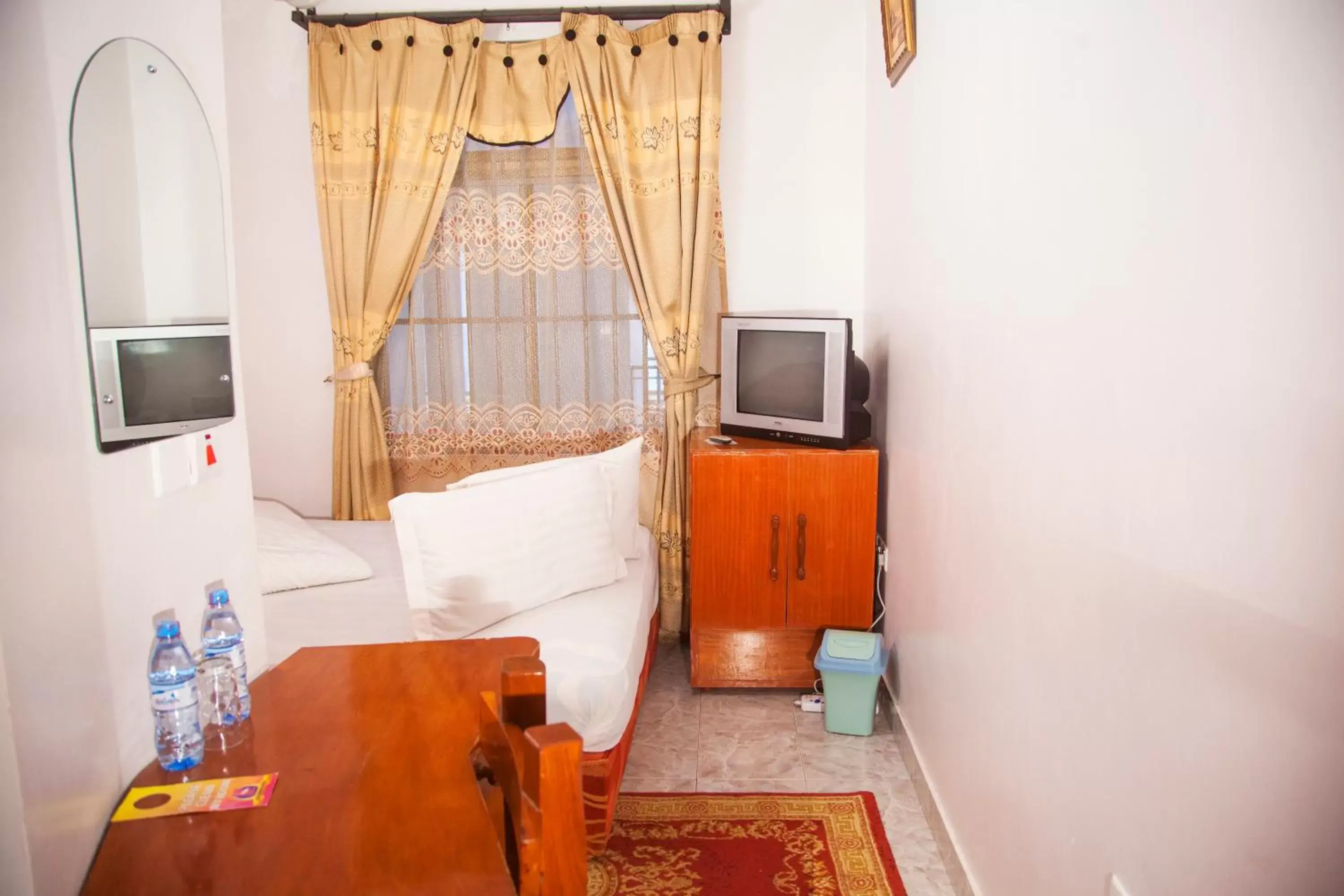 Photo of the whole room, TV/Entertainment Center in Natron Palace Hotel