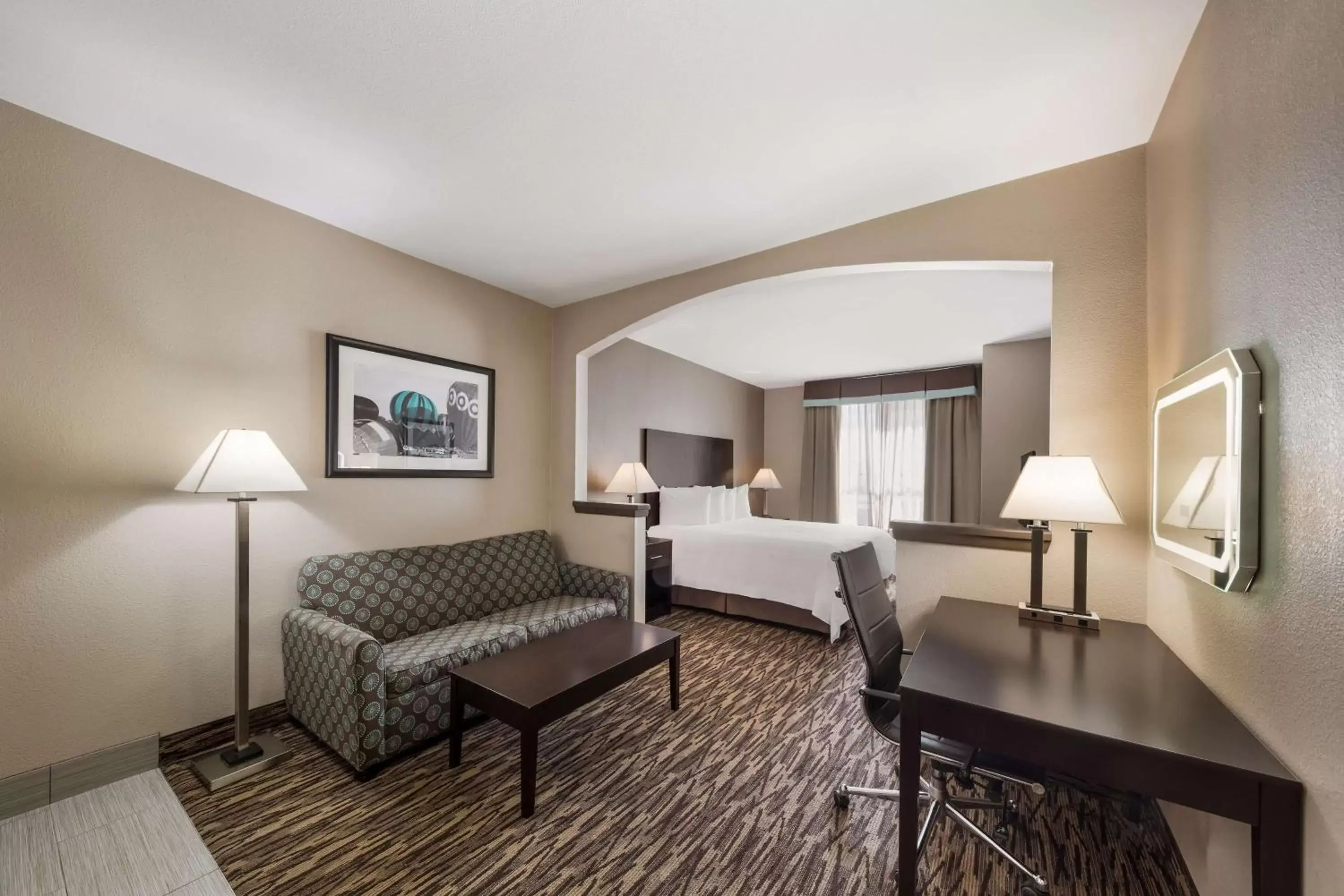 Bedroom, Seating Area in SureStay Plus Hotel by Best Western Plano