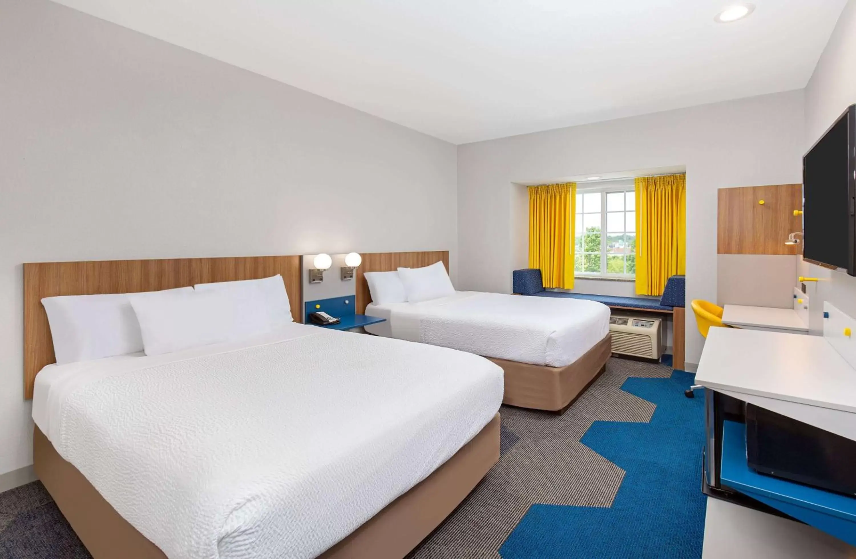 Bed in Microtel Inn and Suites by Wyndham Bed in Microtel Inn and Suites by Wyndham