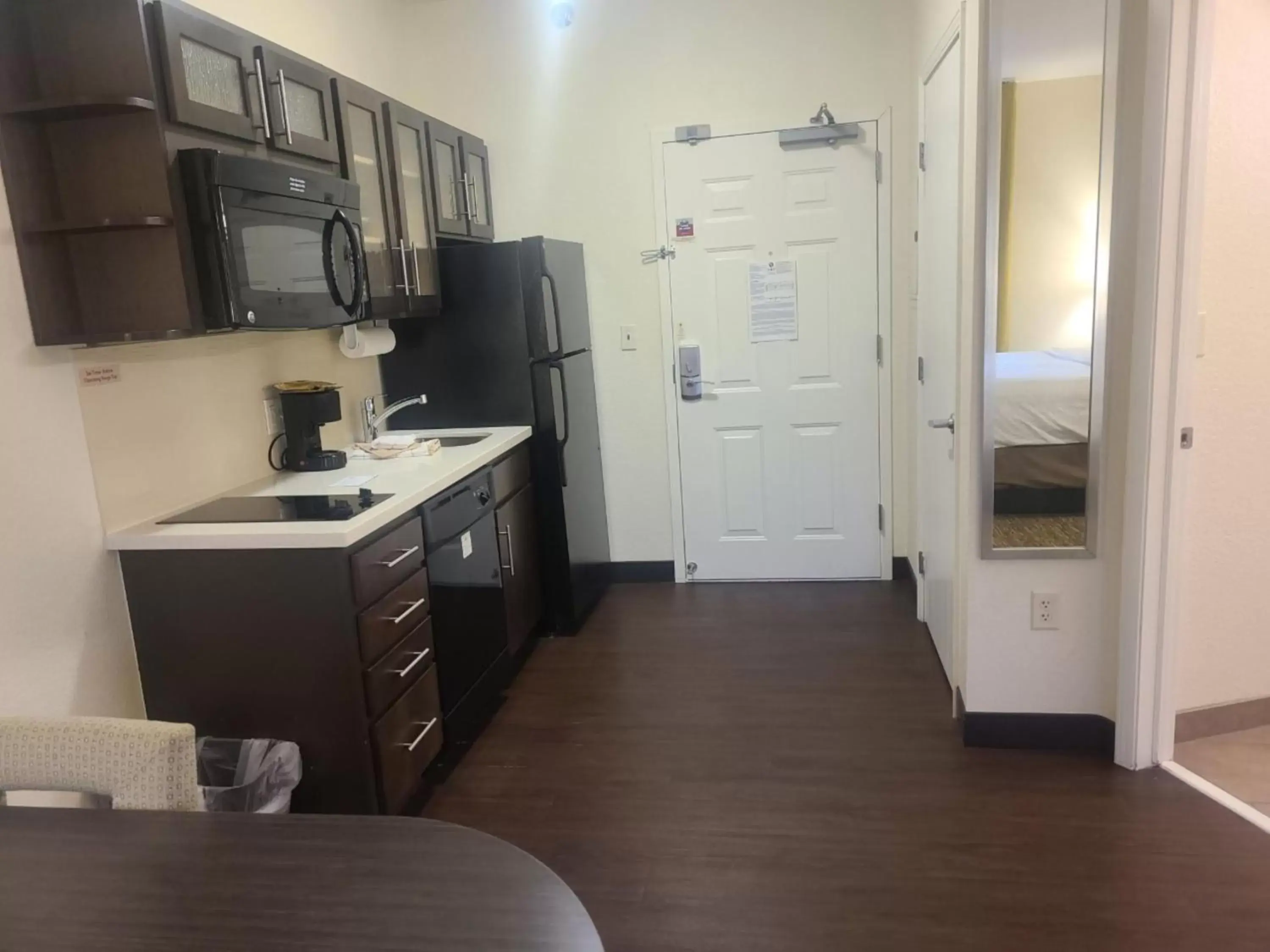 Photo of the whole room, Kitchen/Kitchenette in Candlewood Suites Bismarck