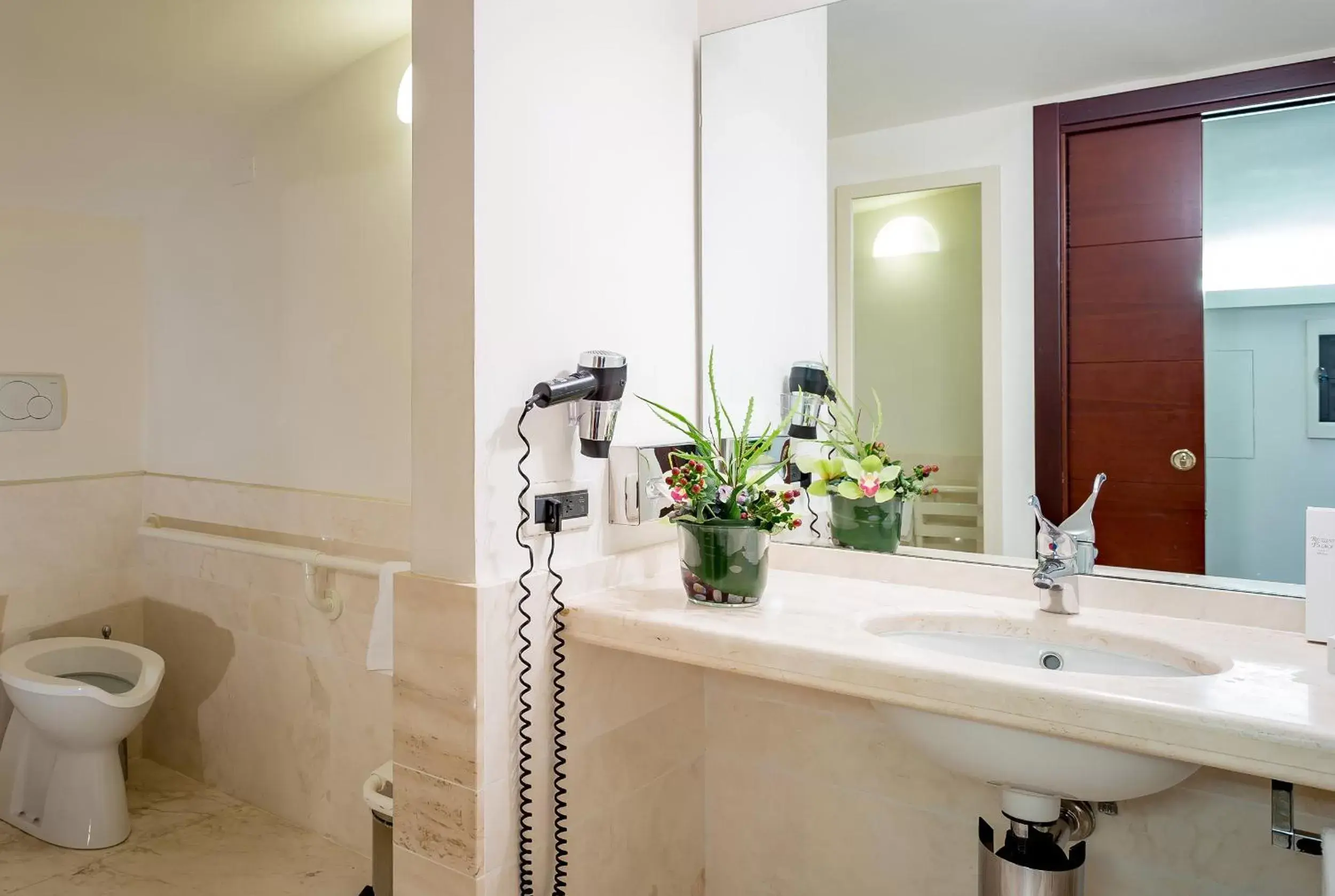 Decorative detail, Bathroom in Ruzzini Palace Hotel