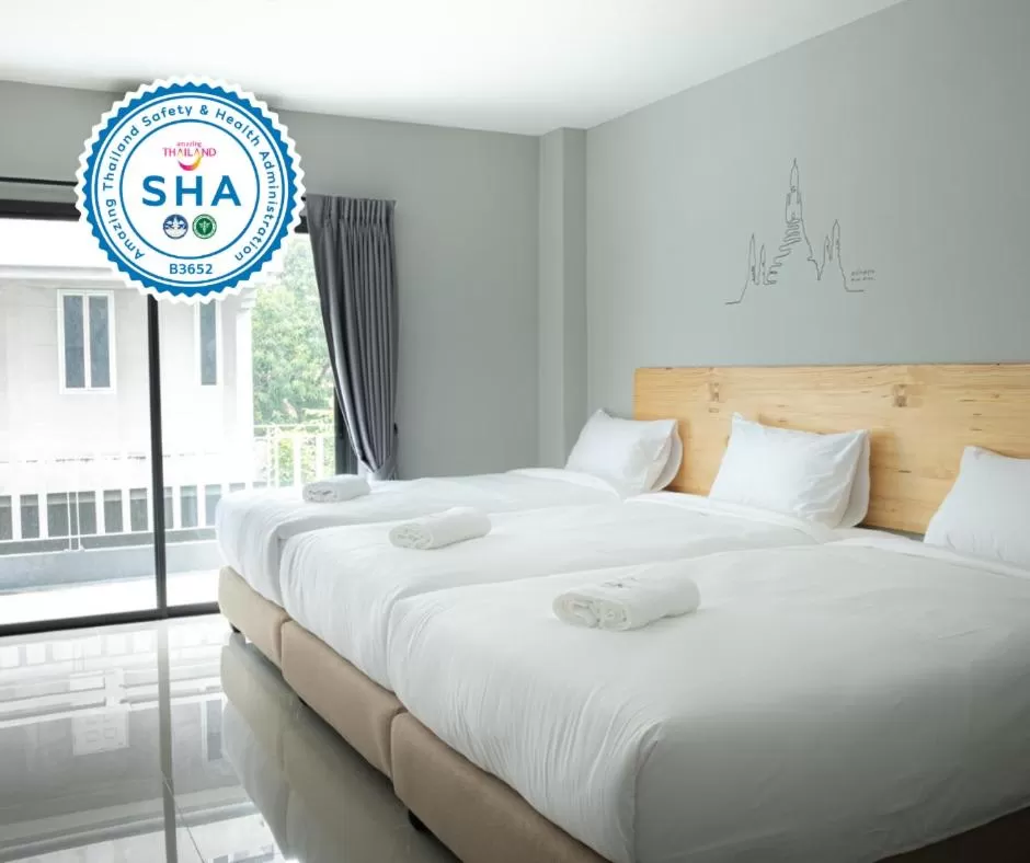 Bed in Fine Bed Hotel