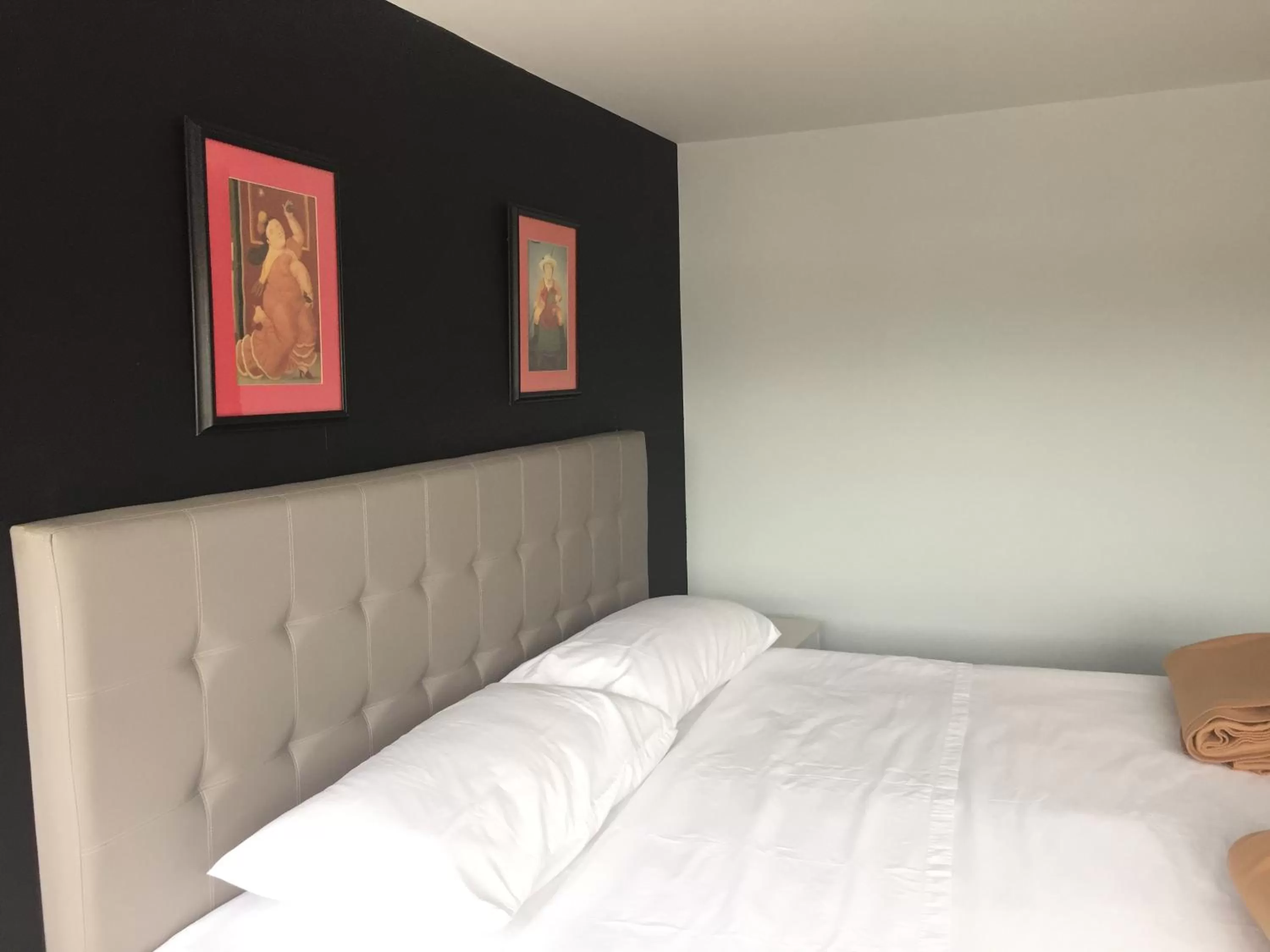 Bed in Hotel Garden City Boutique