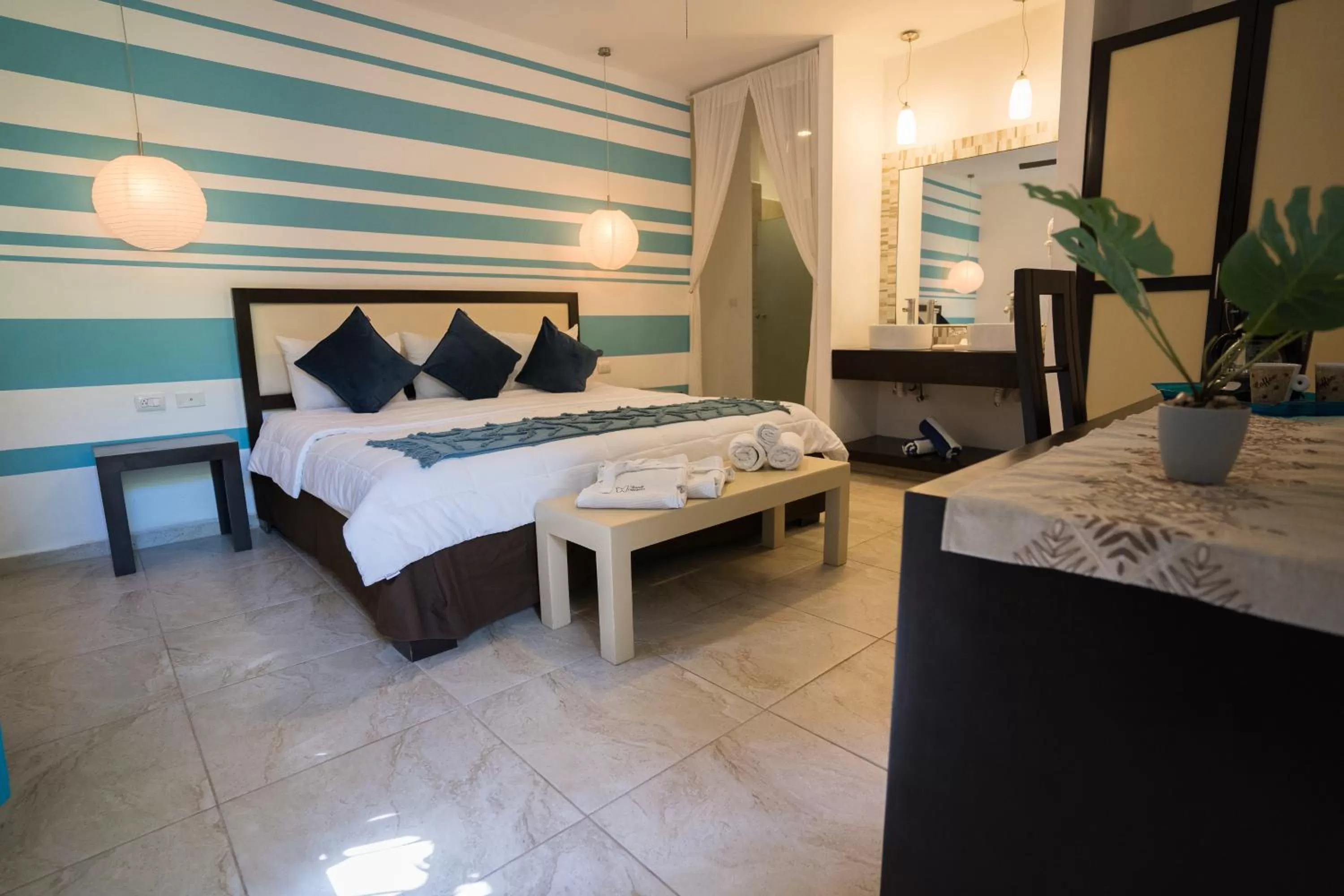 Photo of the whole room, Bed in Posada Mariposa Boutique Hotel - 5th Avenue