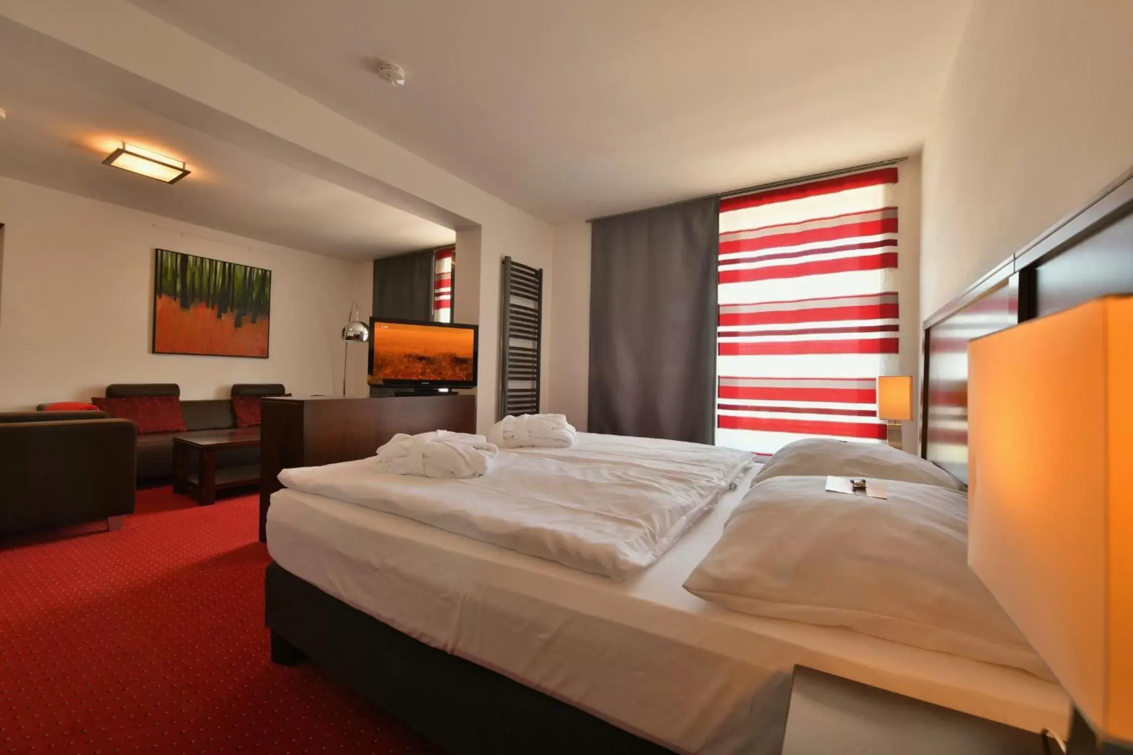 Photo of the whole room, Bed in SKYHOTEL Merseburg