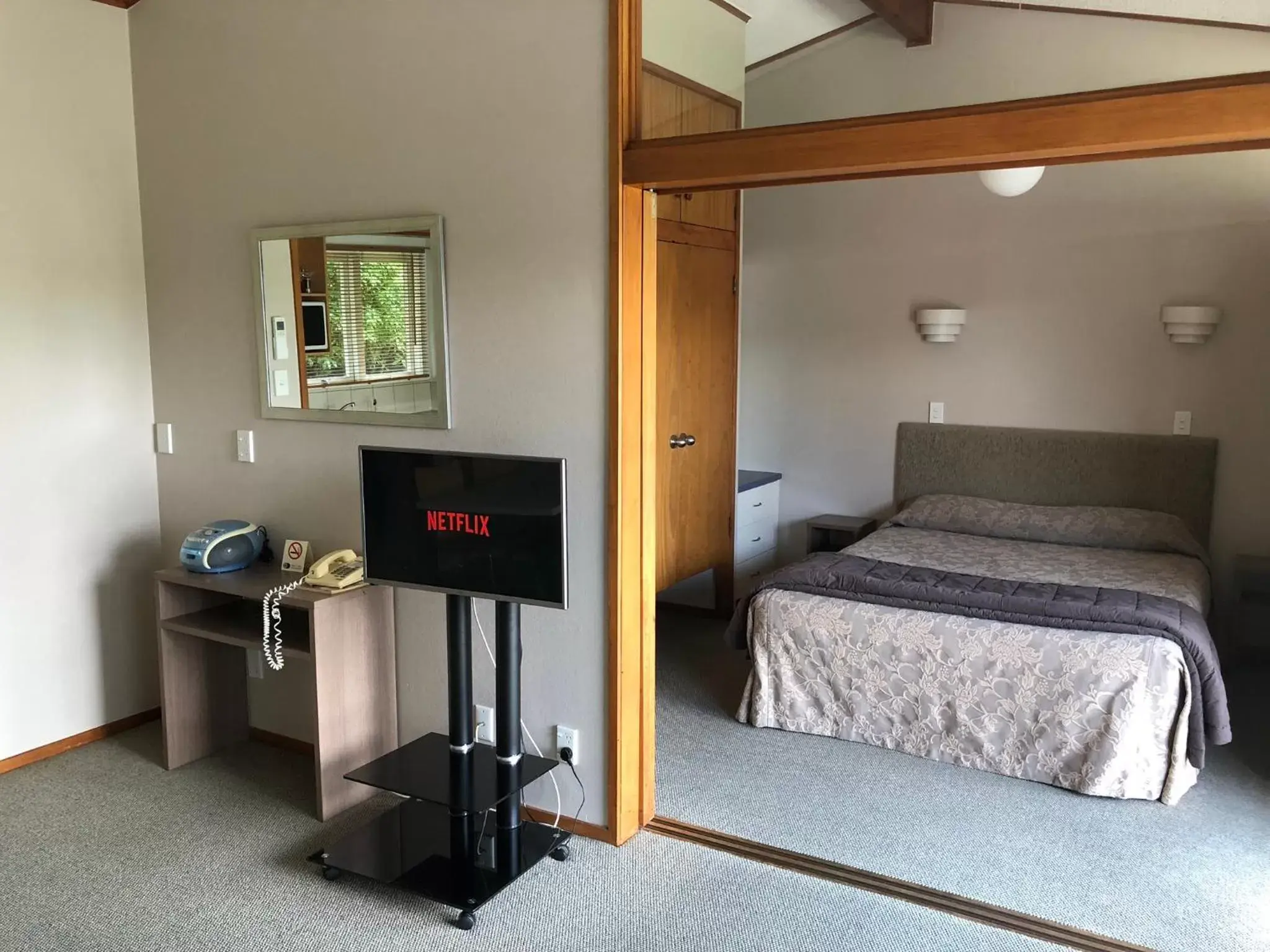 Bedroom in Teal Motor Lodge