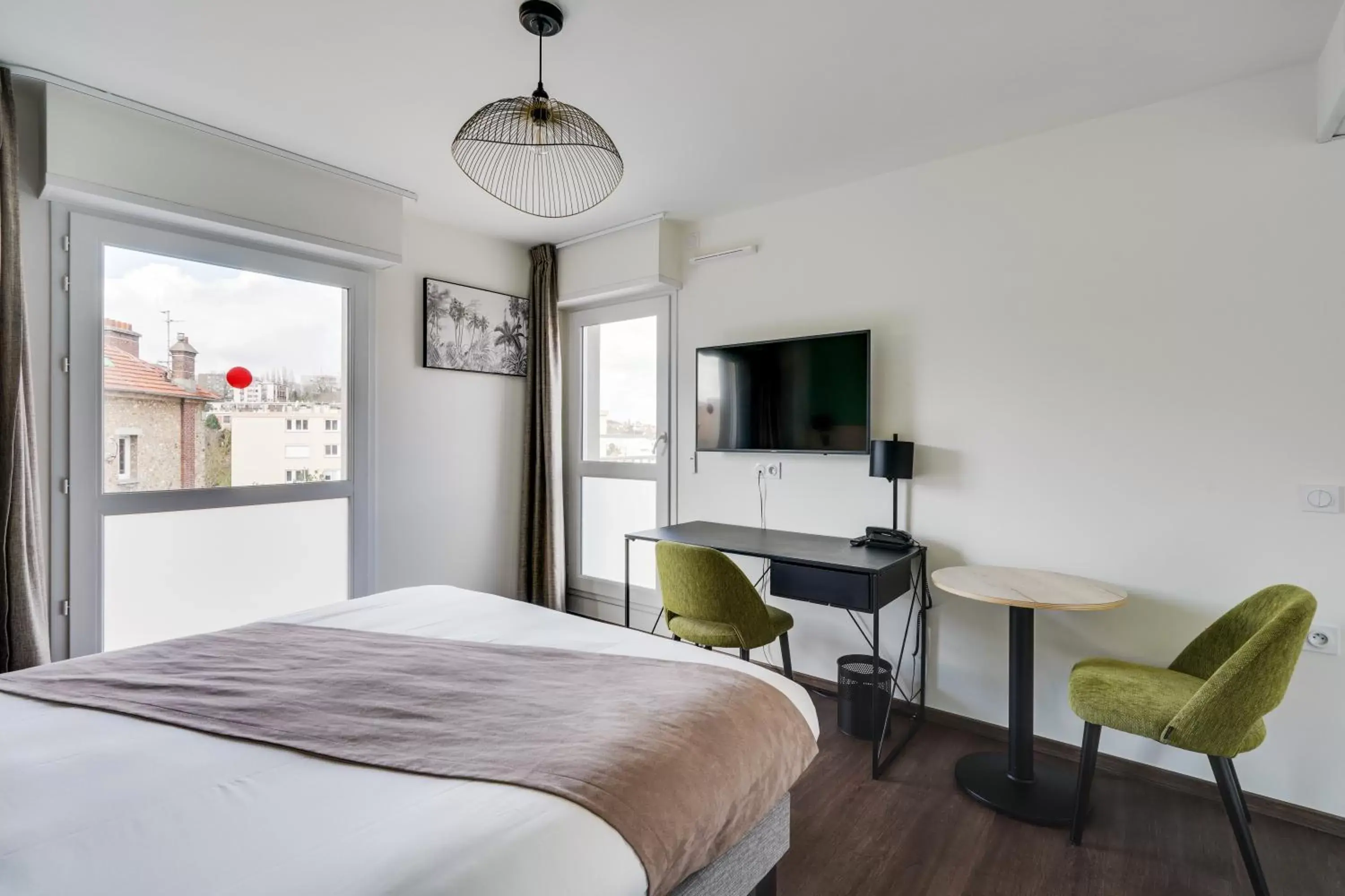 Photo of the whole room in All Suites Appart Hôtel Massy Palaiseau