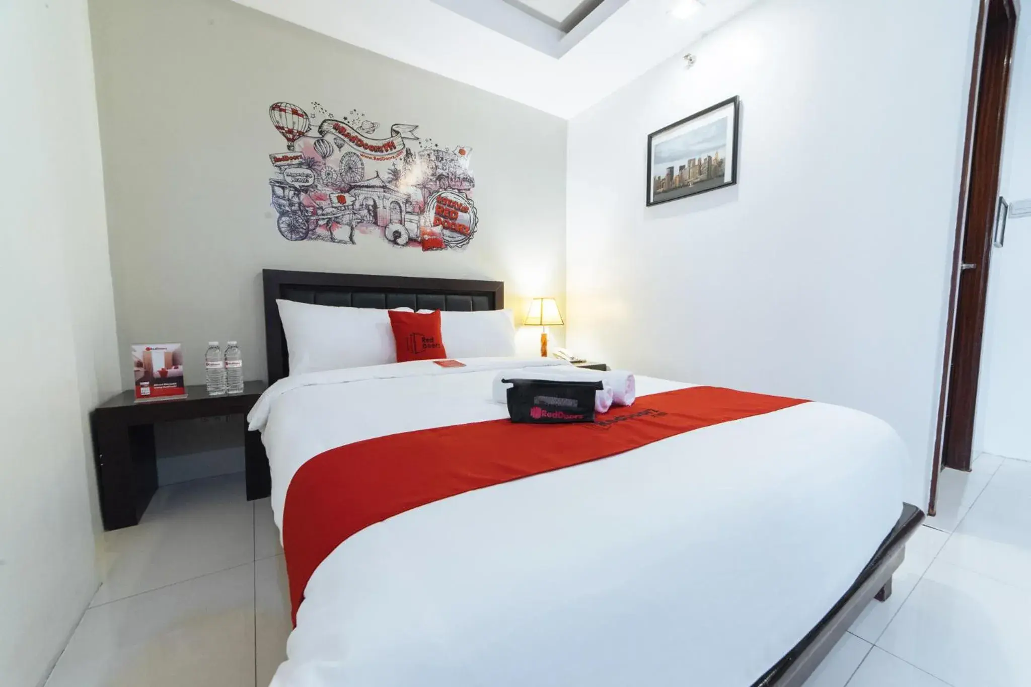 Bedroom, Bed in RedDoorz Plus at One Liberty Hotel Kalayaan Avenue