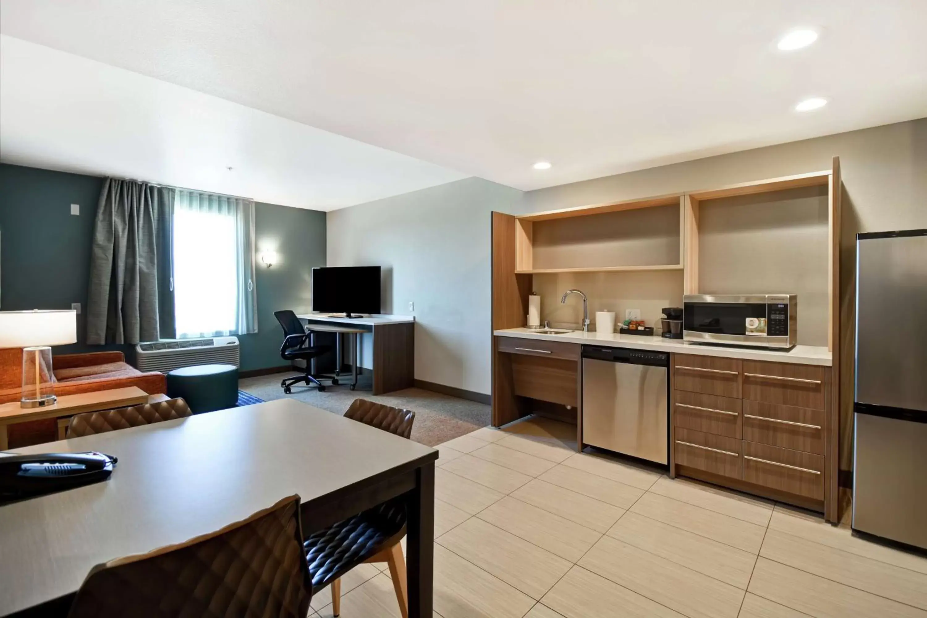 Bedroom, Kitchen/Kitchenette in Home2 Suites by Hilton Victorville