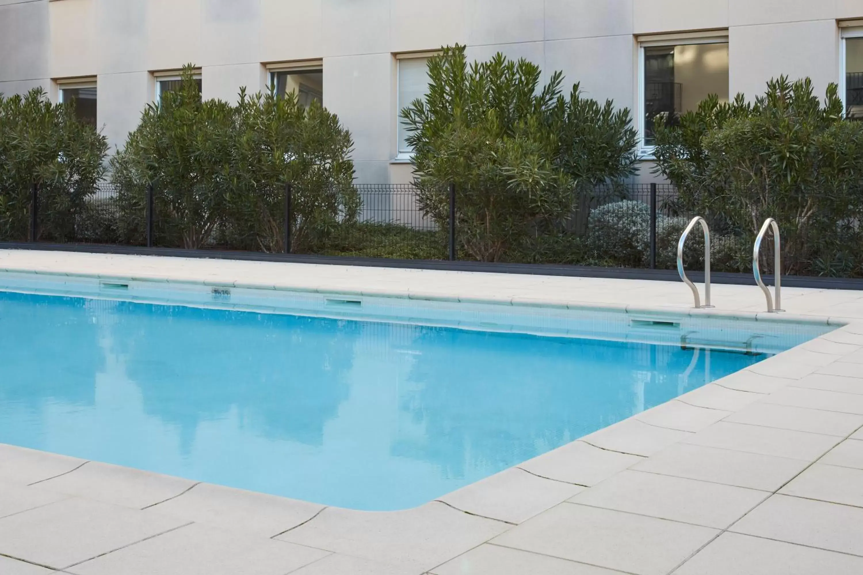 Swimming Pool in Aparthotel Adagio Access Bordeaux Rodesse