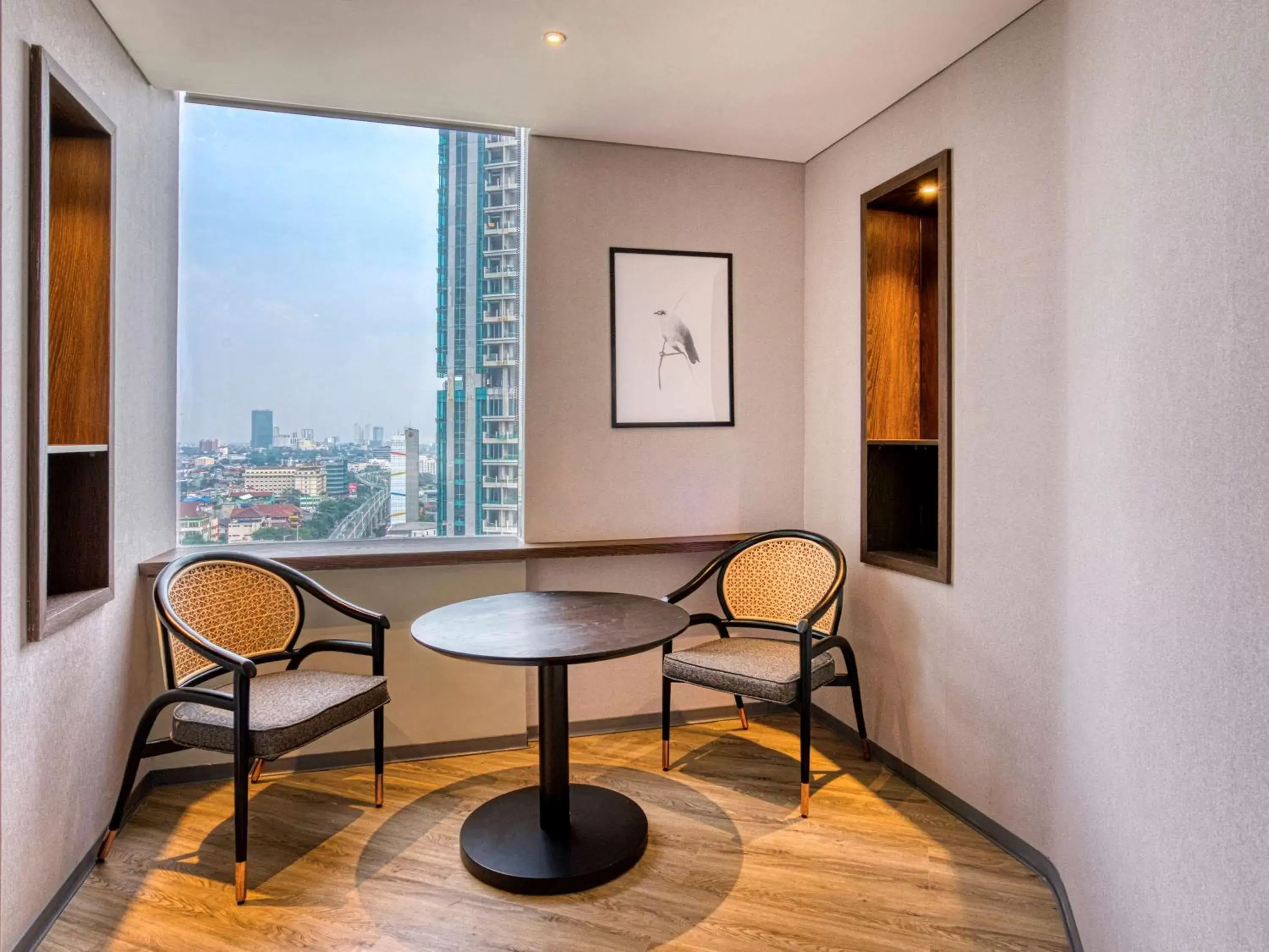 Photo of the whole room, Seating Area in Mercure Jakarta Gatot Subroto