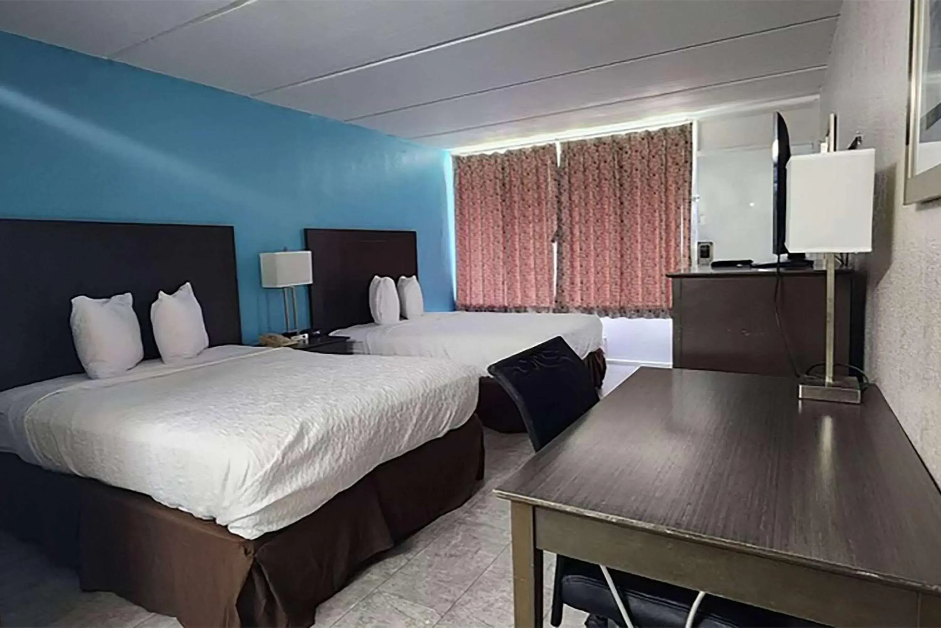 Photo of the whole room in Travelodge by Wyndham Kingsland GA