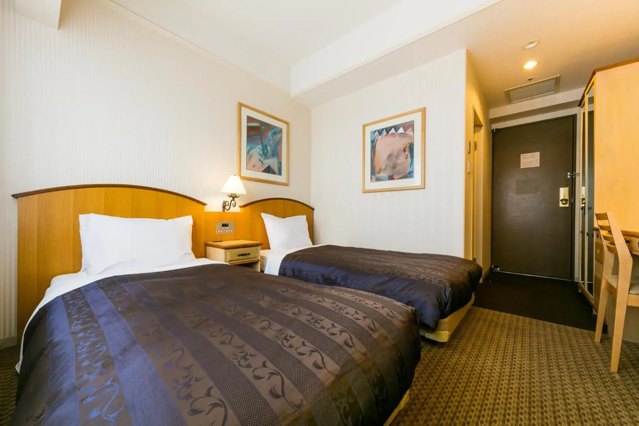 Photo of the whole room, Bed in Hotel Resol Sapporo Nakajima Koen