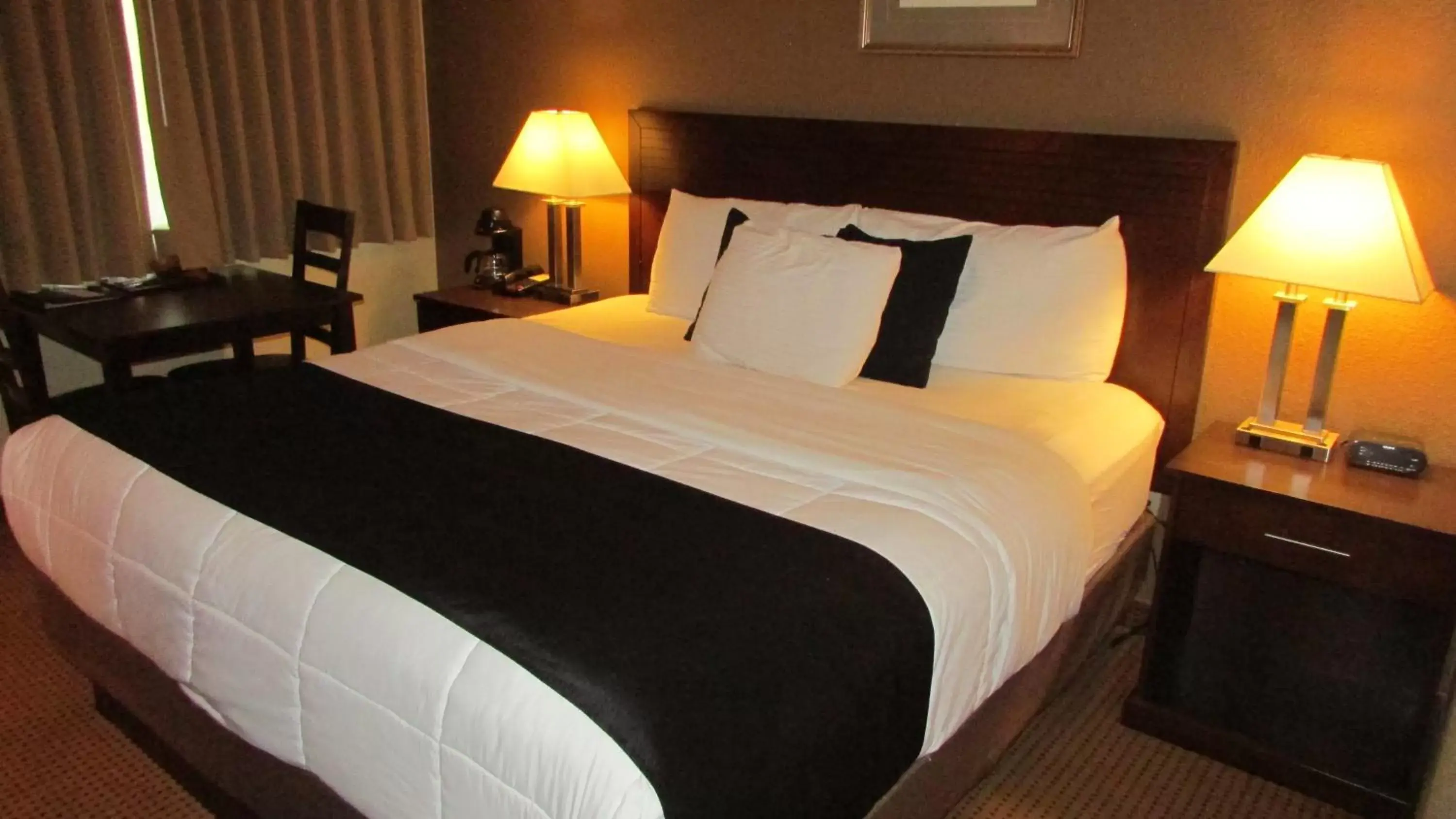 Photo of the whole room, Bed in FairBridge Inn & Suites
