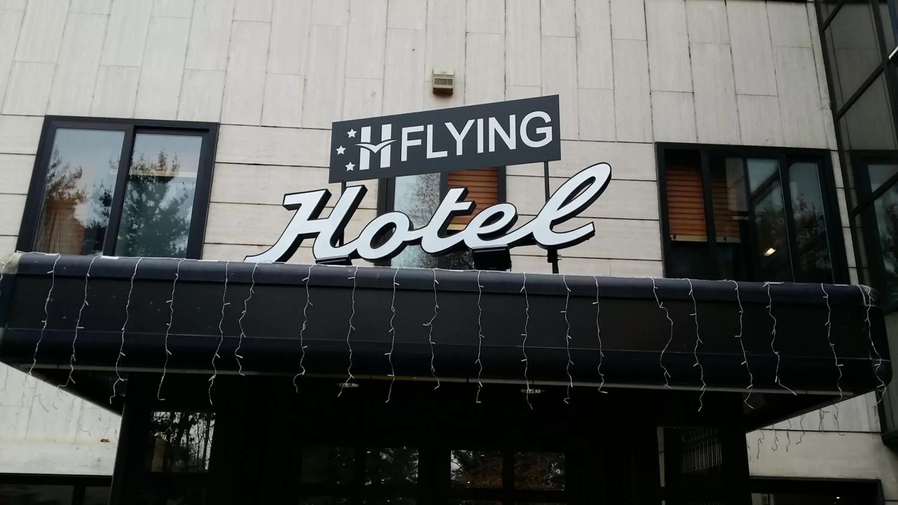 Facade/entrance, Property Logo/Sign in Flying Hotel