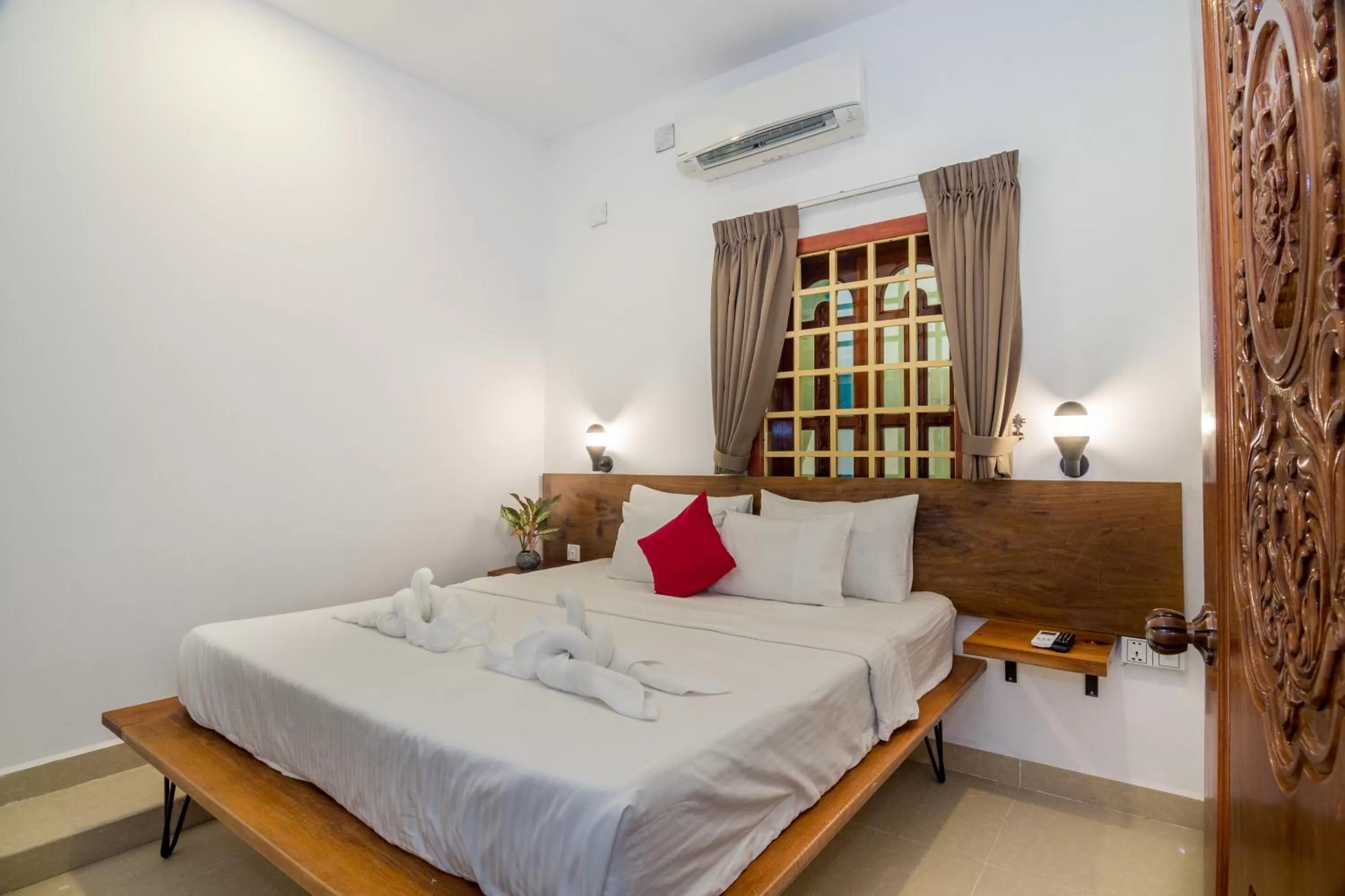 Bed in Poolside Villa