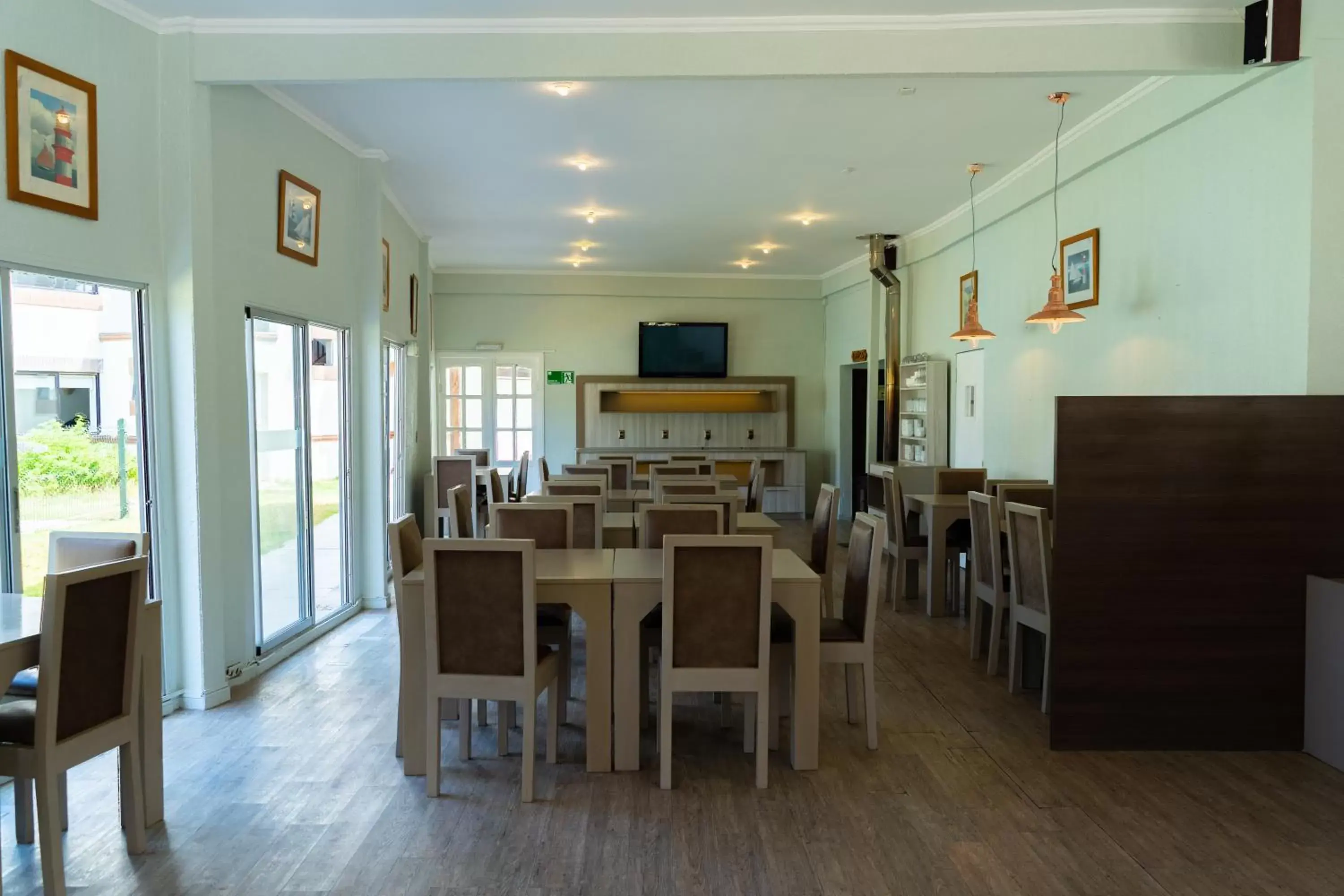 Communal lounge/ TV room, Dining Area in Hotel Palmas de La Serena