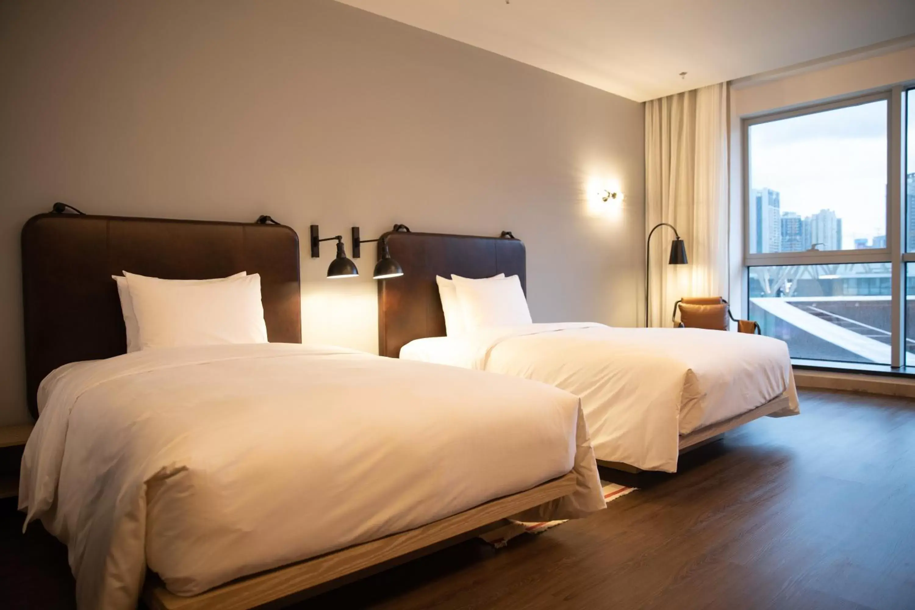 Standard Twin Room with City View in Moxy Shenzhen North Station Standard Twin Room with City View in Moxy Shenzhen North Station