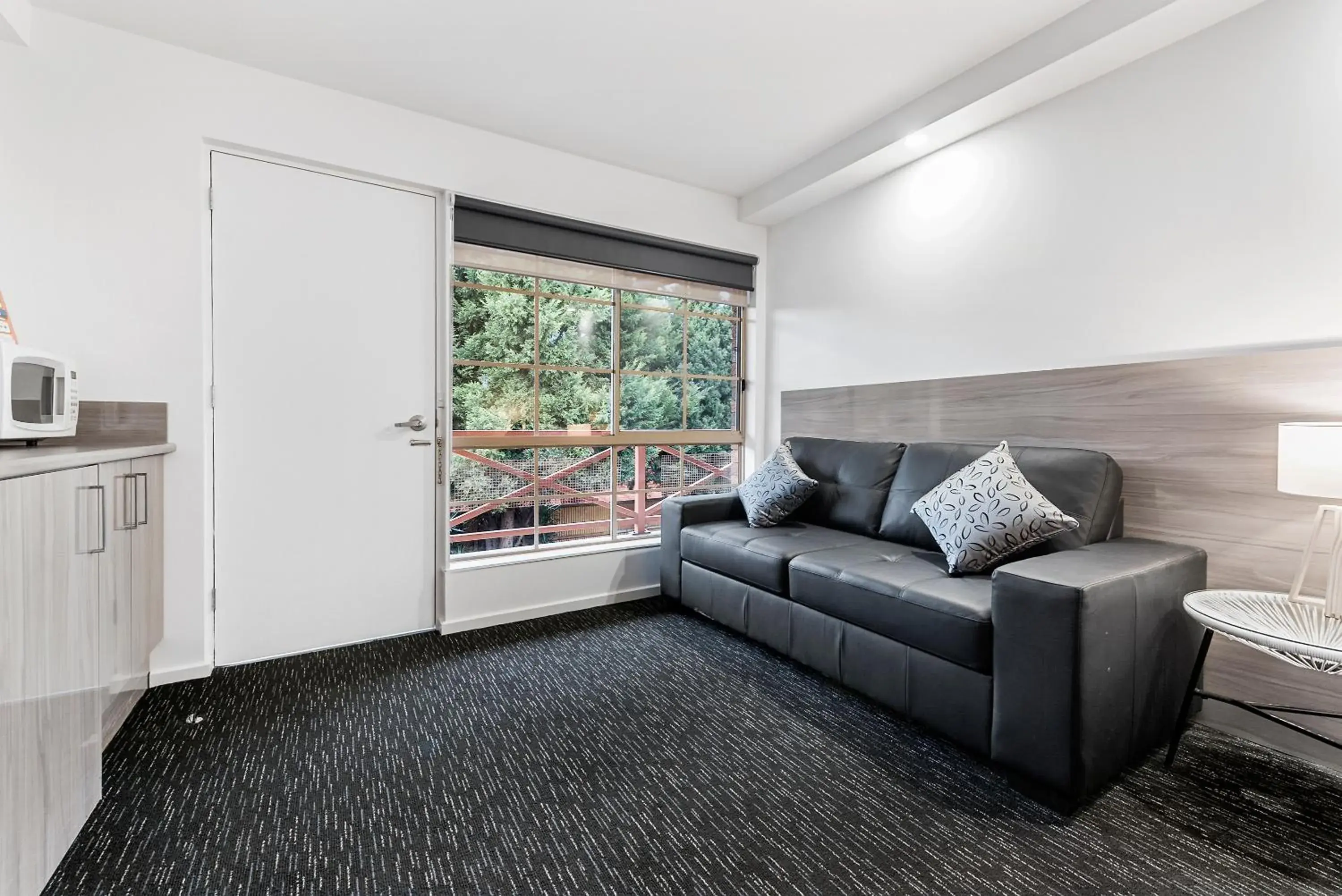 Photo of the whole room, Seating Area in Bay City Geelong Motel