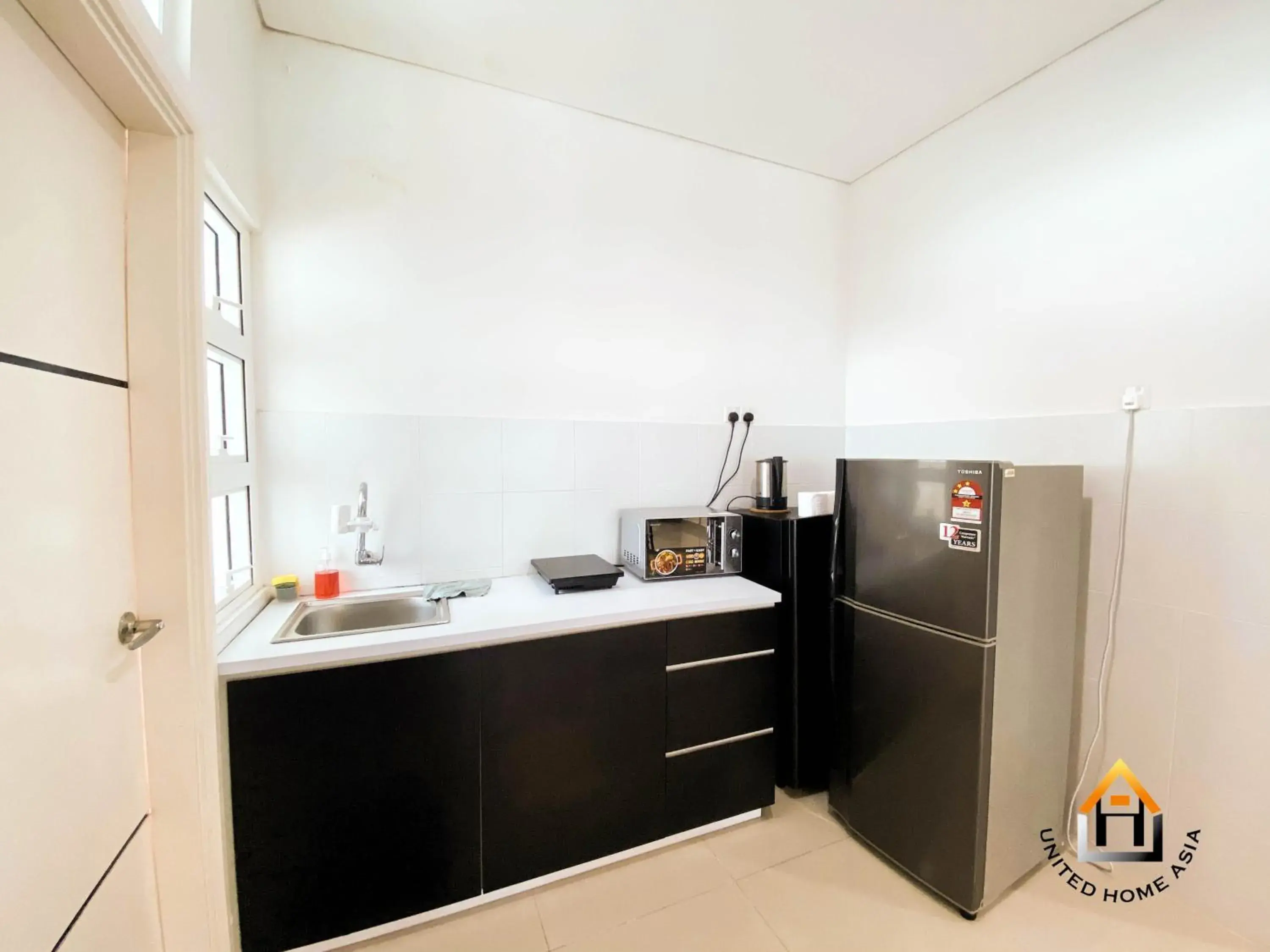Kitchen or kitchenette, Bathroom in Holi 1Medini Themed Suites