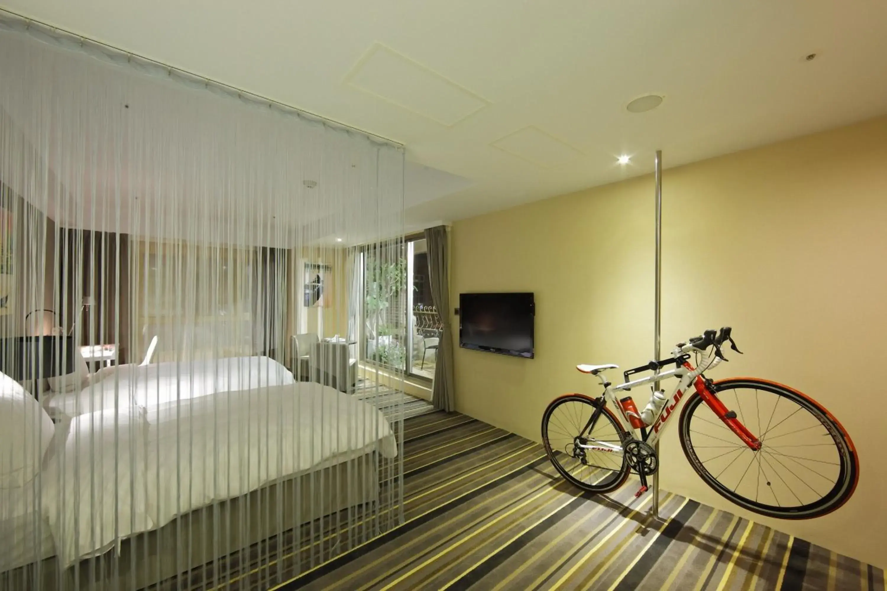 Bedroom, TV/Entertainment Center in Hotelday Plus Tamsui